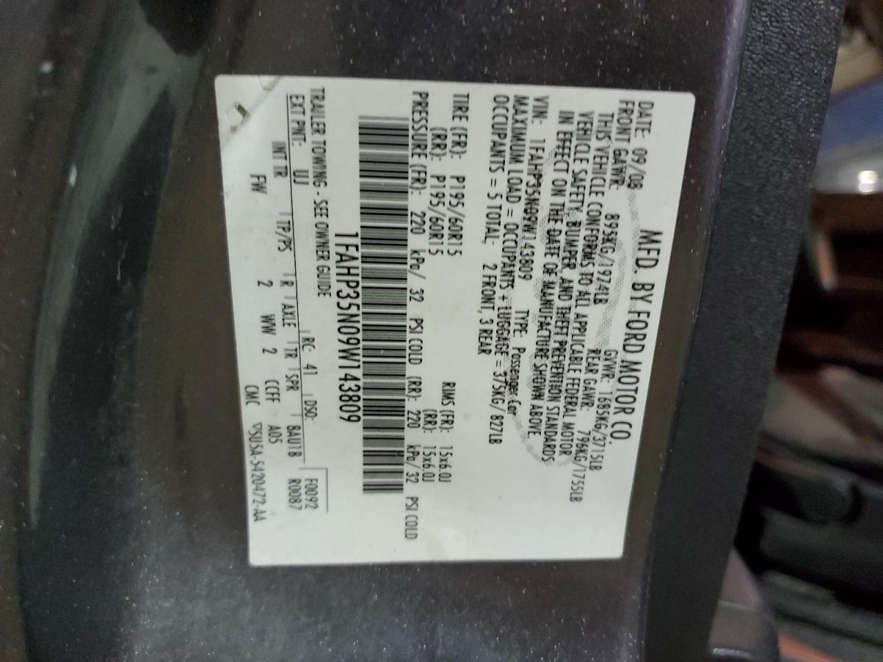 2009 Ford Focus VIN 1FAHP35N09W143809 Copart auction photo, side damage thumbnail 12