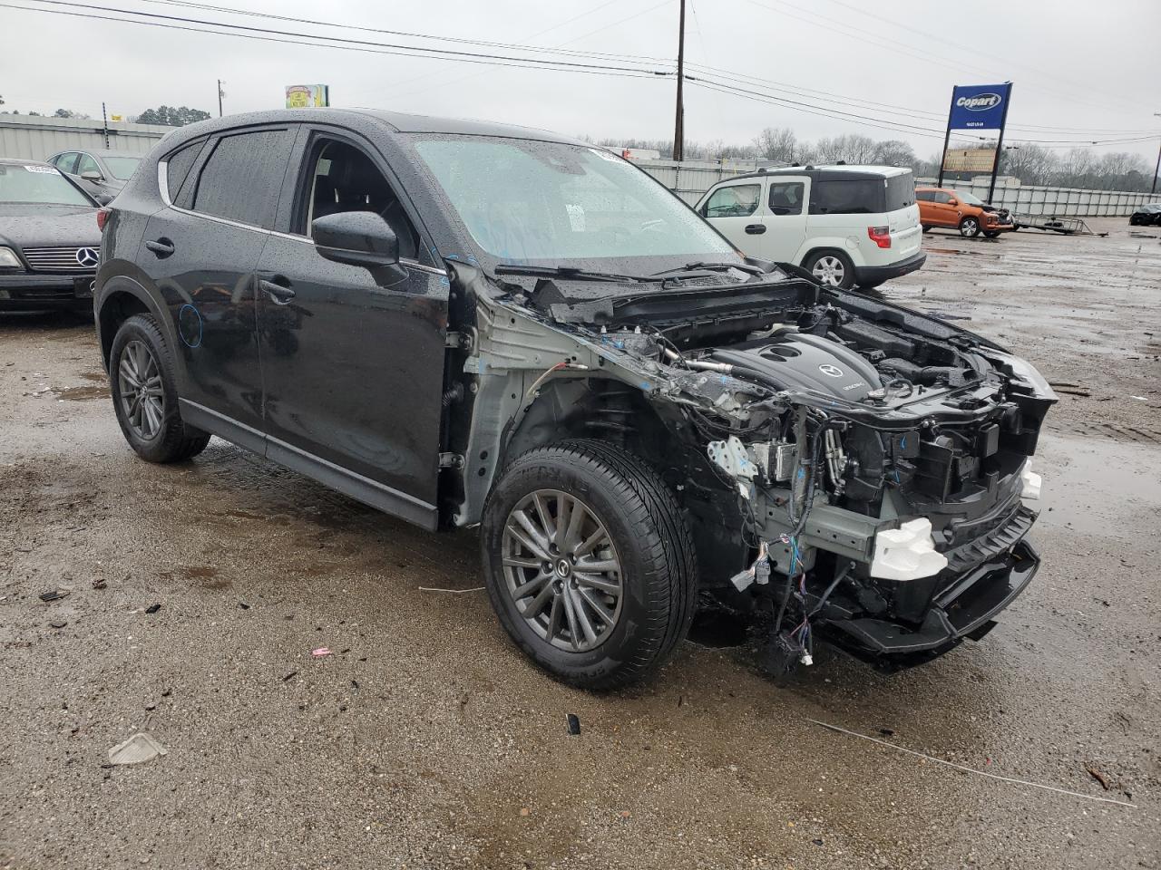 2021 Mazda CX-5 VIN JM3KFBCM5M1408115 Copart auction photo, front end / side damage thumbnail 4