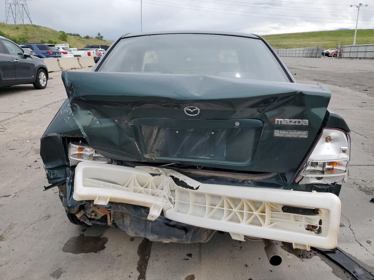 1999 Mazda Protege VIN JM1BJ2210X0150711 Copart auction photo, rear end damage thumbnail 6