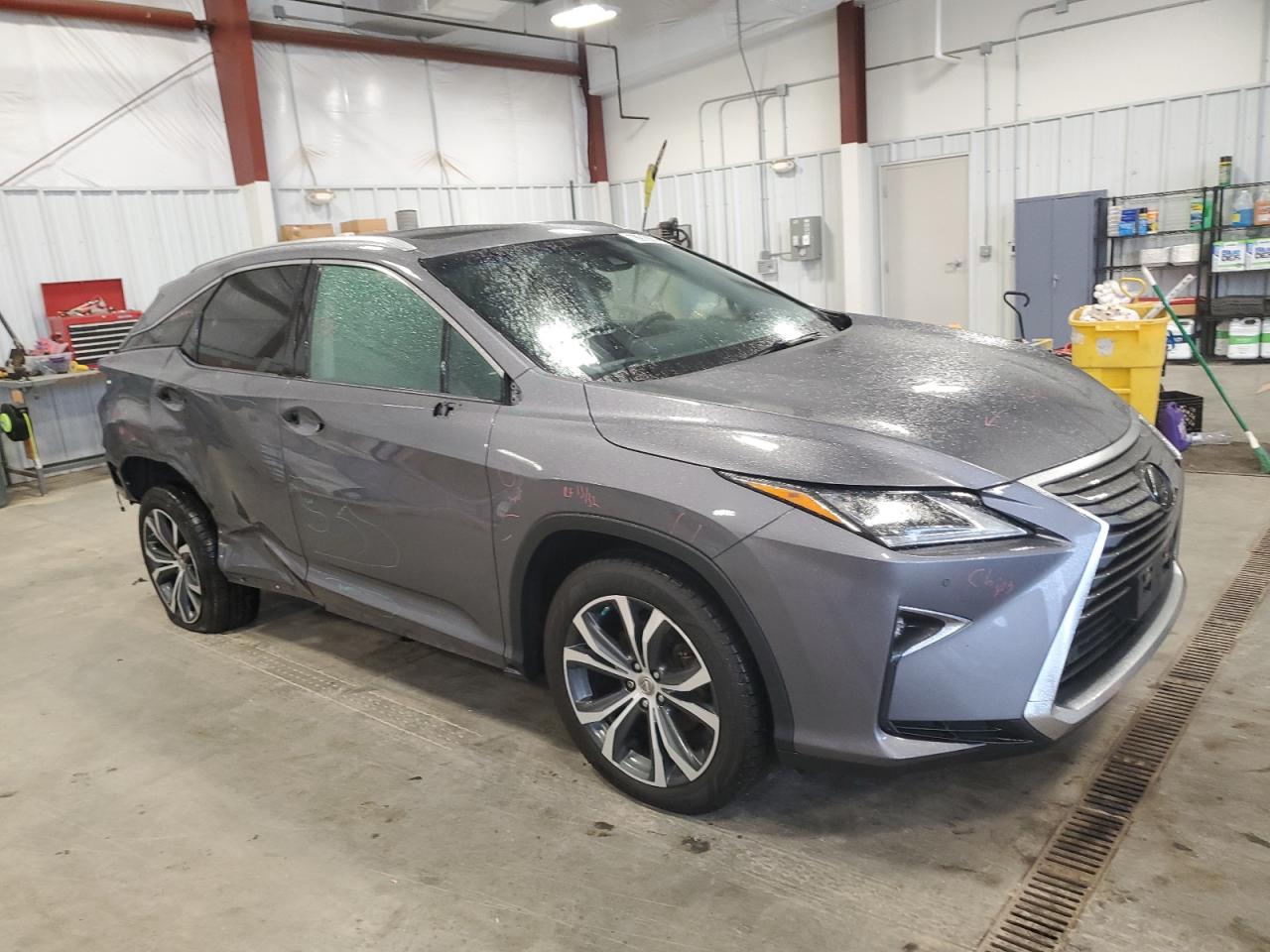 2017 Lexus RX VIN 2T2BZMCAXHC117169 Copart auction photo, side / rear end damage thumbnail 4