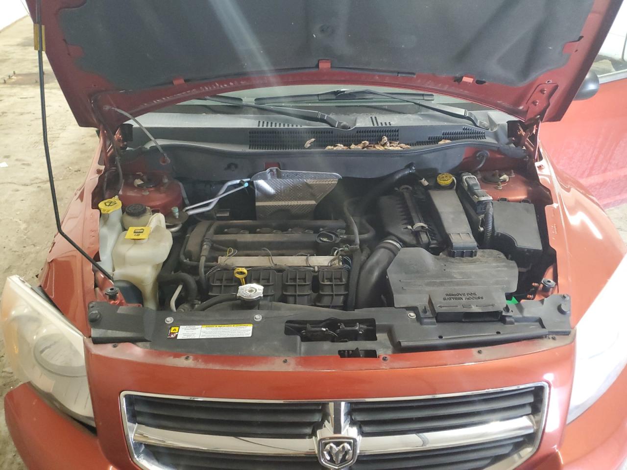 2010 Dodge Caliber VIN 1B3CB3HAXAD598440 Copart auction photo, side / front end damage thumbnail 11