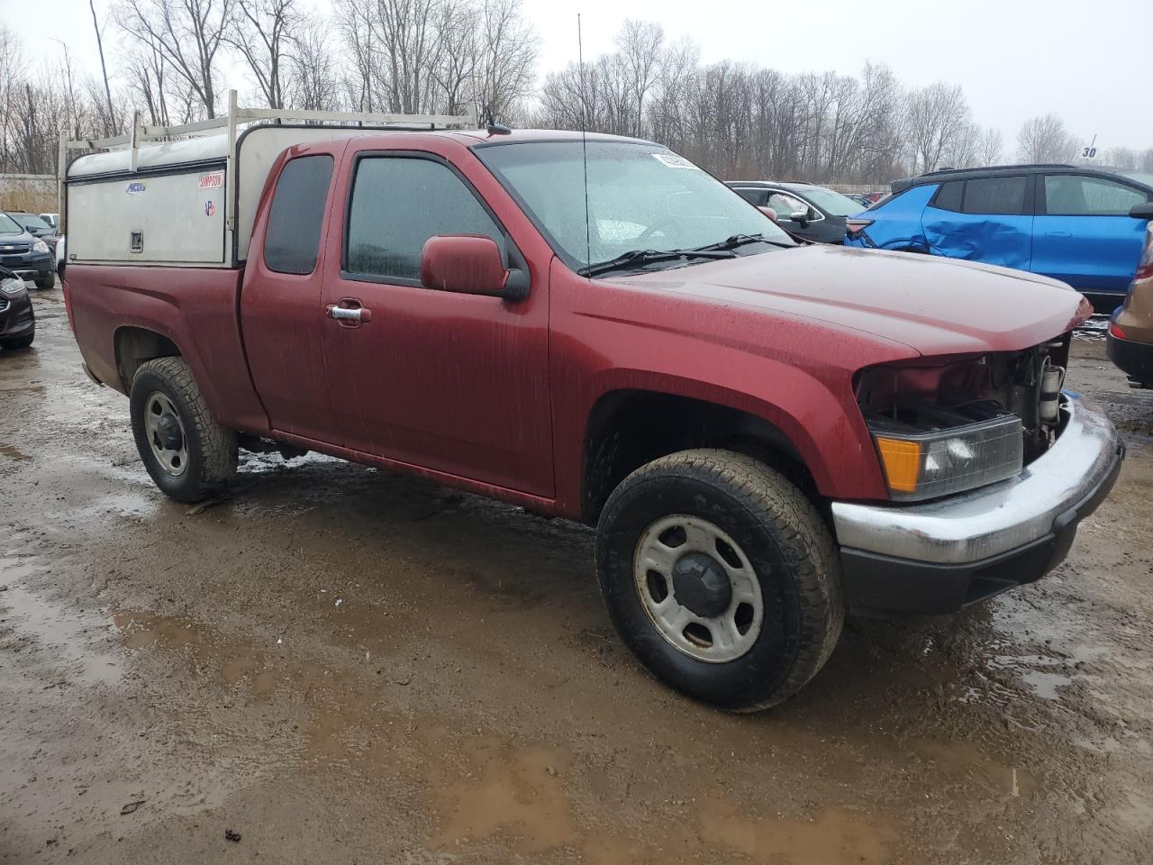 2011 GMC Canyon VIN 1GTJ6LF91B8120128 Copart auction photo, front end / side damage thumbnail 4