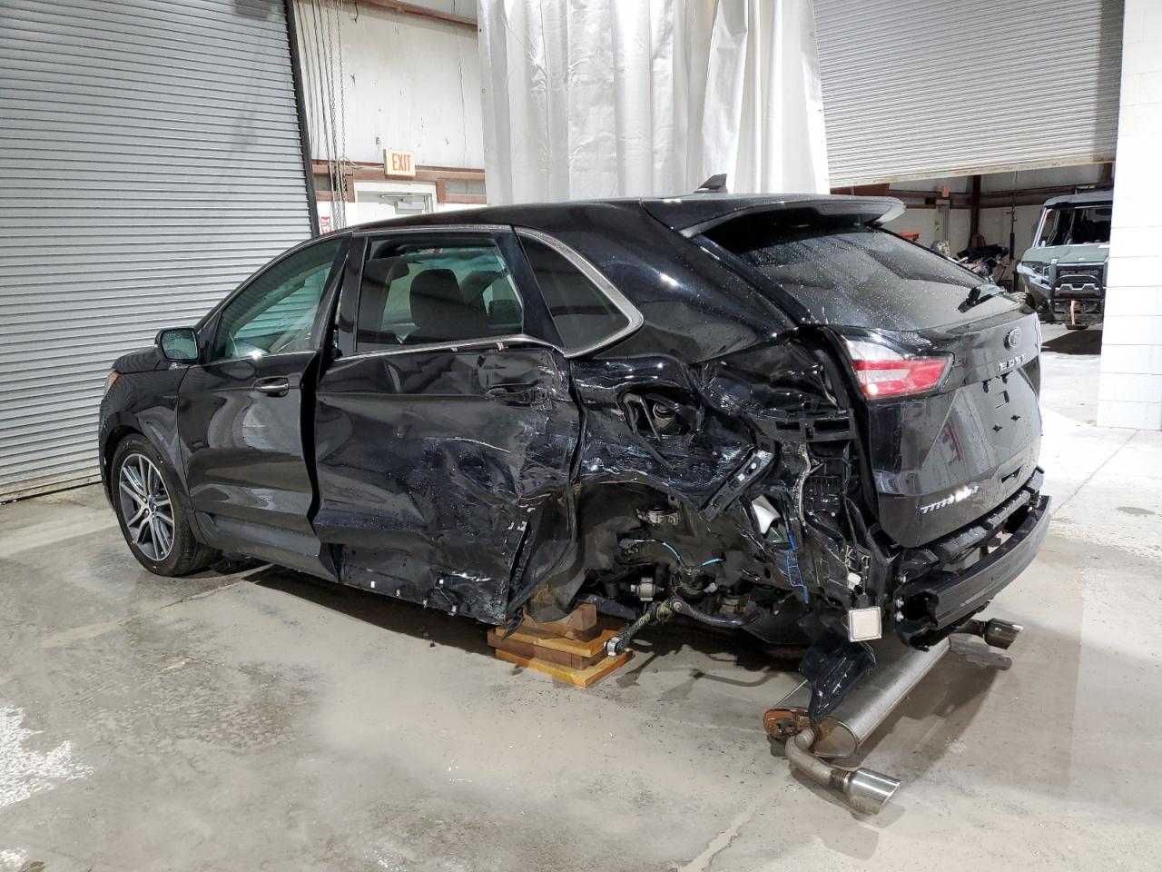 2021 Ford Edge VIN 2FMPK4K92MBA18897 Copart auction photo, rear end / side damage thumbnail 2