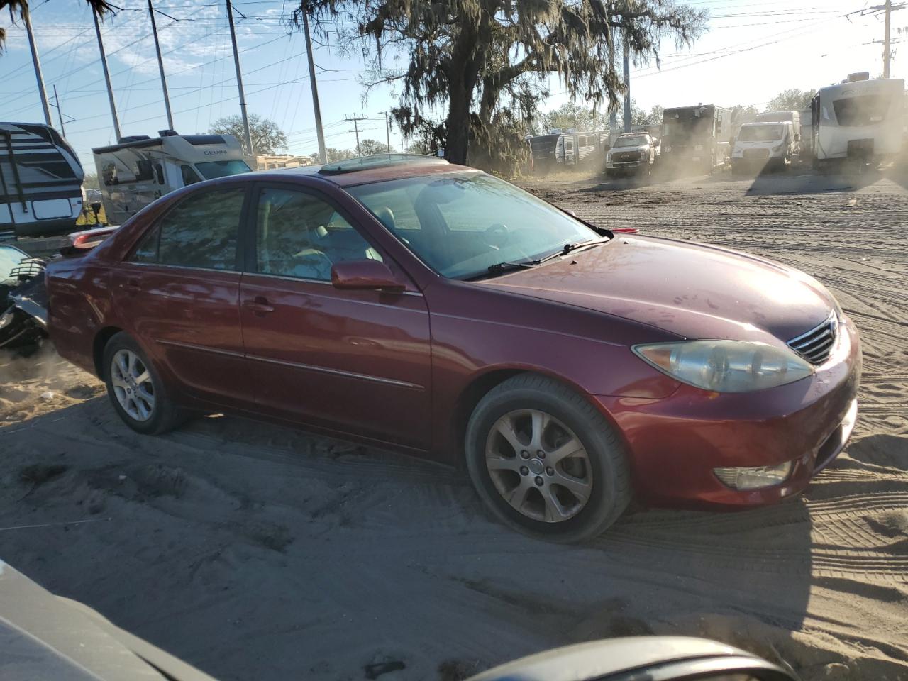 2005 Toyota Camry VIN 4T1BE32K05U393858 Copart auction photo, rear end / minor dent/scratches damage thumbnail 4