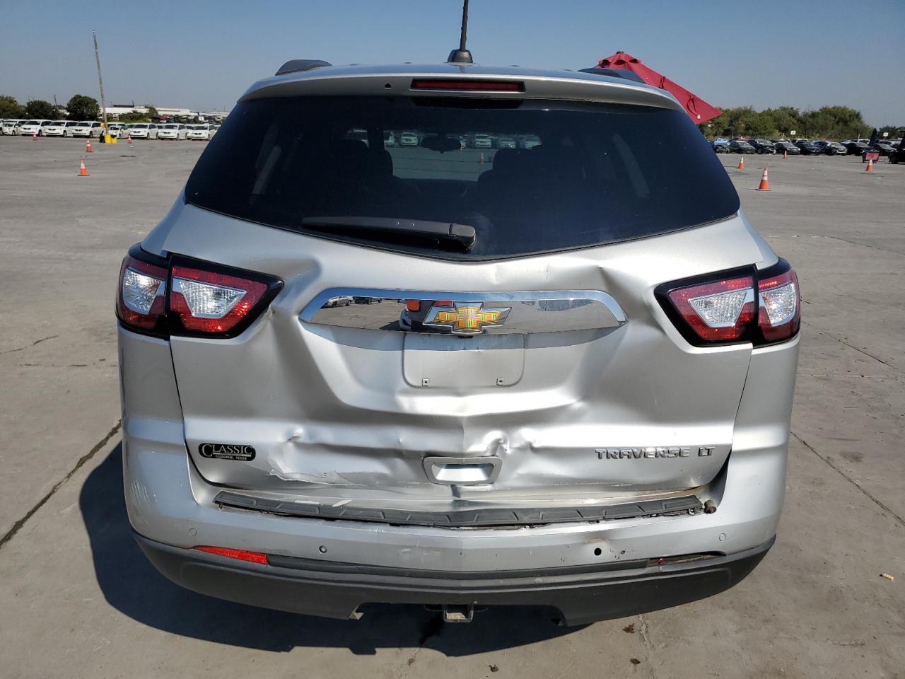 2016 Chevrolet Traverse VIN 1GNKRGKDXGJ191218 Copart auction photo, rear end / minor dent/scratches damage thumbnail 6