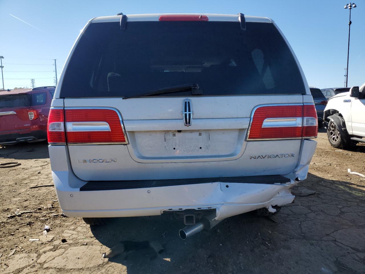 2010 Lincoln Navigator VIN 5LMJJ2J50AEJ00409 Copart auction photo, rear end damage thumbnail 6