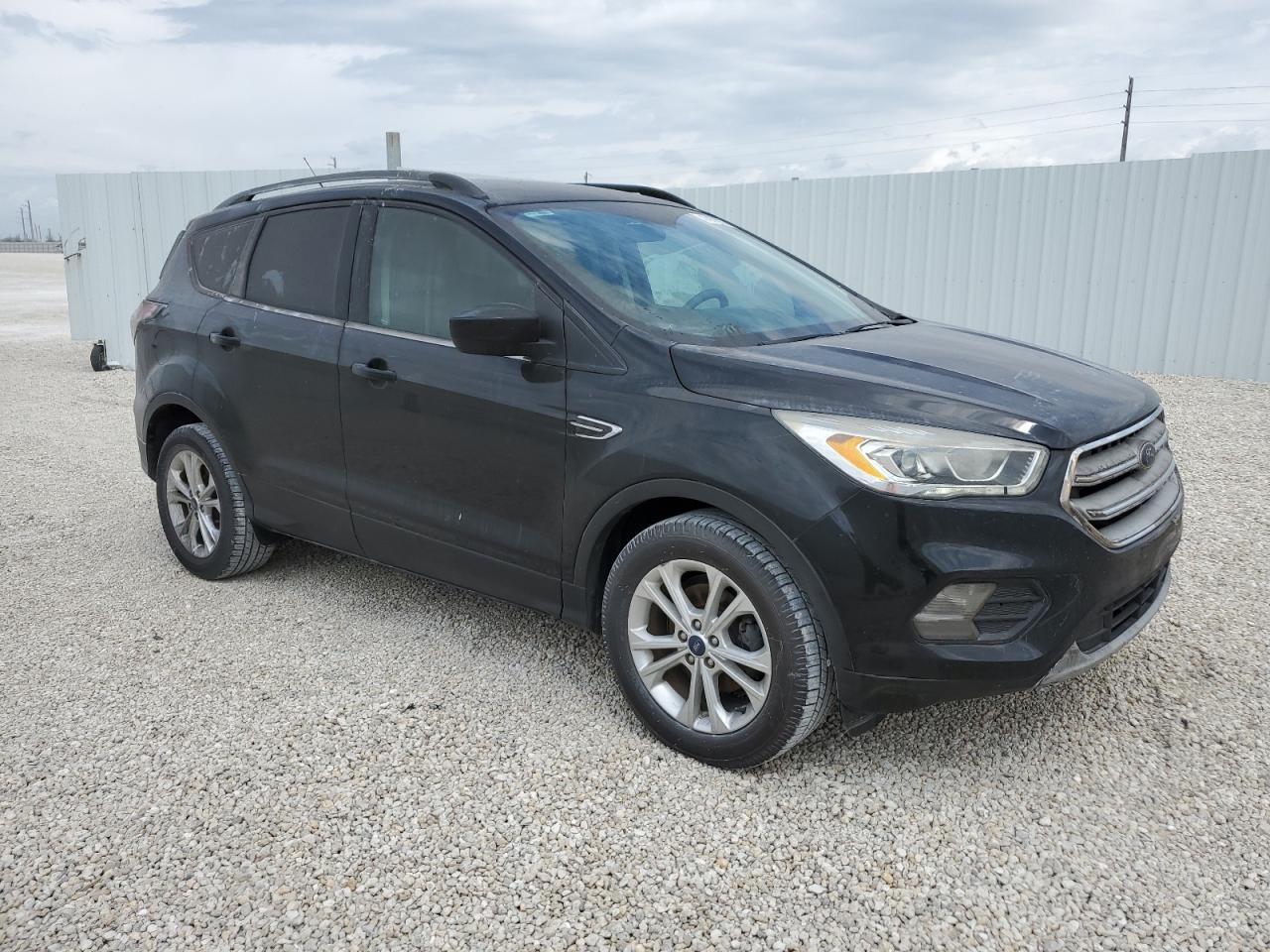2017 Ford Escape VIN 1FMCU0GD1HUF02297 Copart auction photo, water/flood / minor dent/scratches damage thumbnail 4