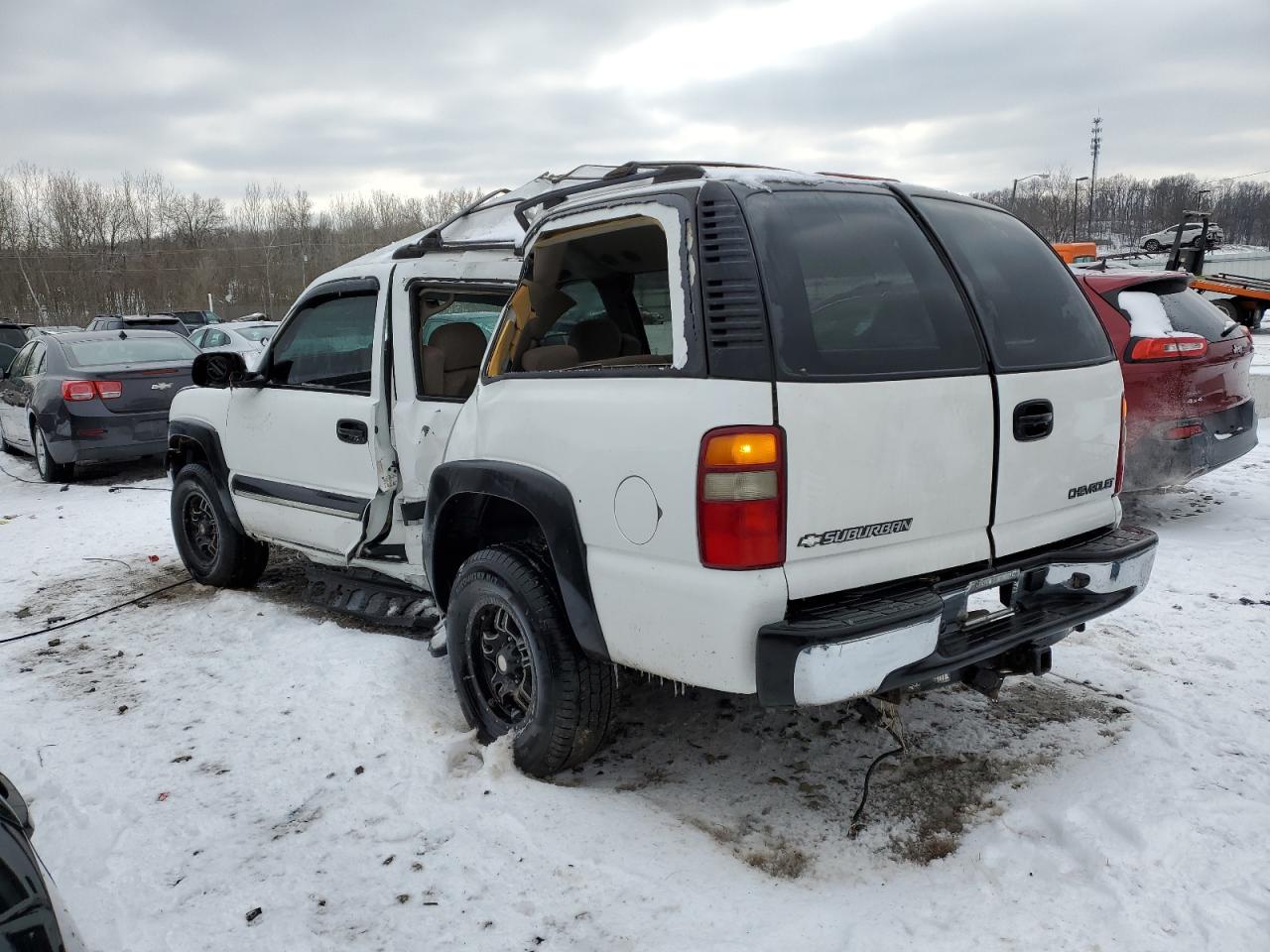 2002 Chevrolet Suburban VIN 3GNEC16Z12G274483 Copart auction photo, side / front end damage thumbnail 2
