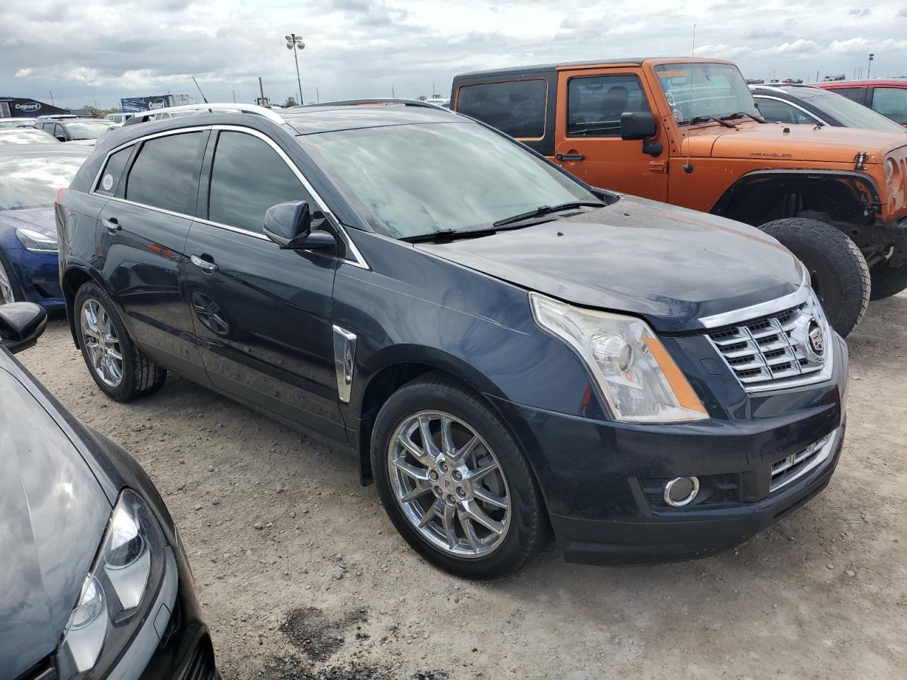 2014 Cadillac SRX VIN 3GYFNCE39ES578415 Copart auction photo, water/flood damage thumbnail 4