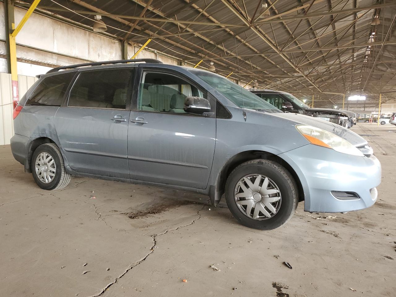 2010 Toyota Sienna VIN 5TDKK4CC9AS297333 Copart auction photo, rear end / side damage thumbnail 4