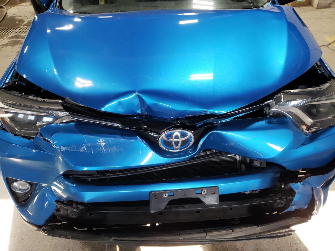 2016 Toyota RAV 4 VIN JTMRJREV7GD058445 Copart auction photo, front end / side damage thumbnail 12