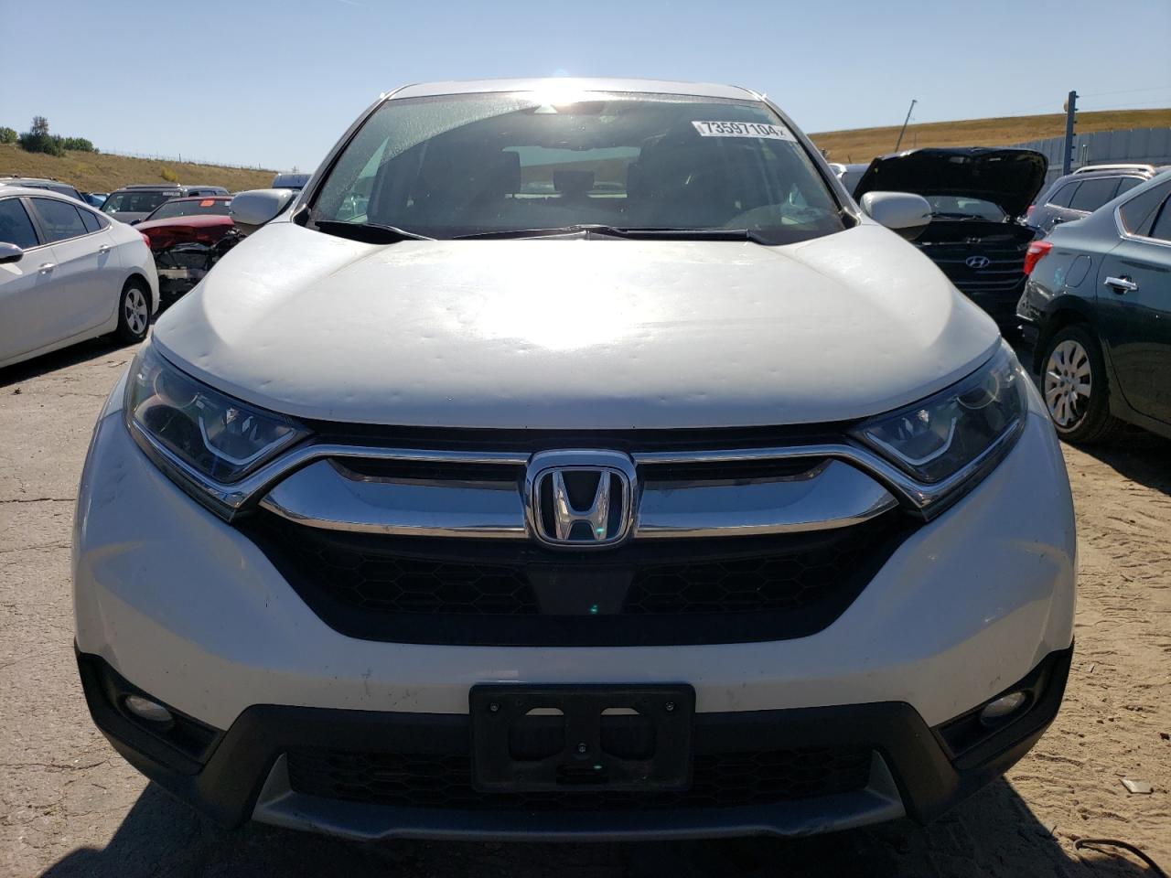 2017 Honda CR-V VIN 2HKRW2H87HH650812 Copart auction photo, hail / front end damage thumbnail 5