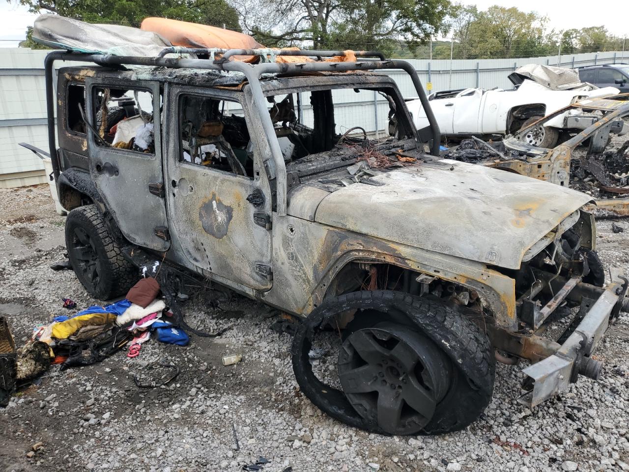 2007 Jeep Wrangler VIN 1J4GA59177L219481 Copart auction photo, burn damage thumbnail 4