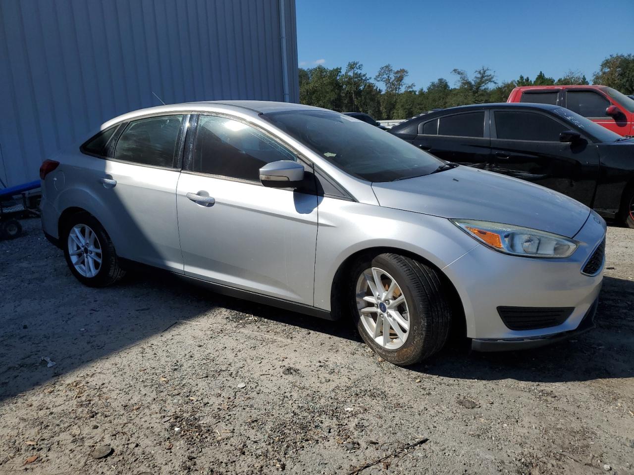 2016 Ford Focus VIN 1FADP3F2XGL255650 Copart auction photo, water/flood damage thumbnail 4