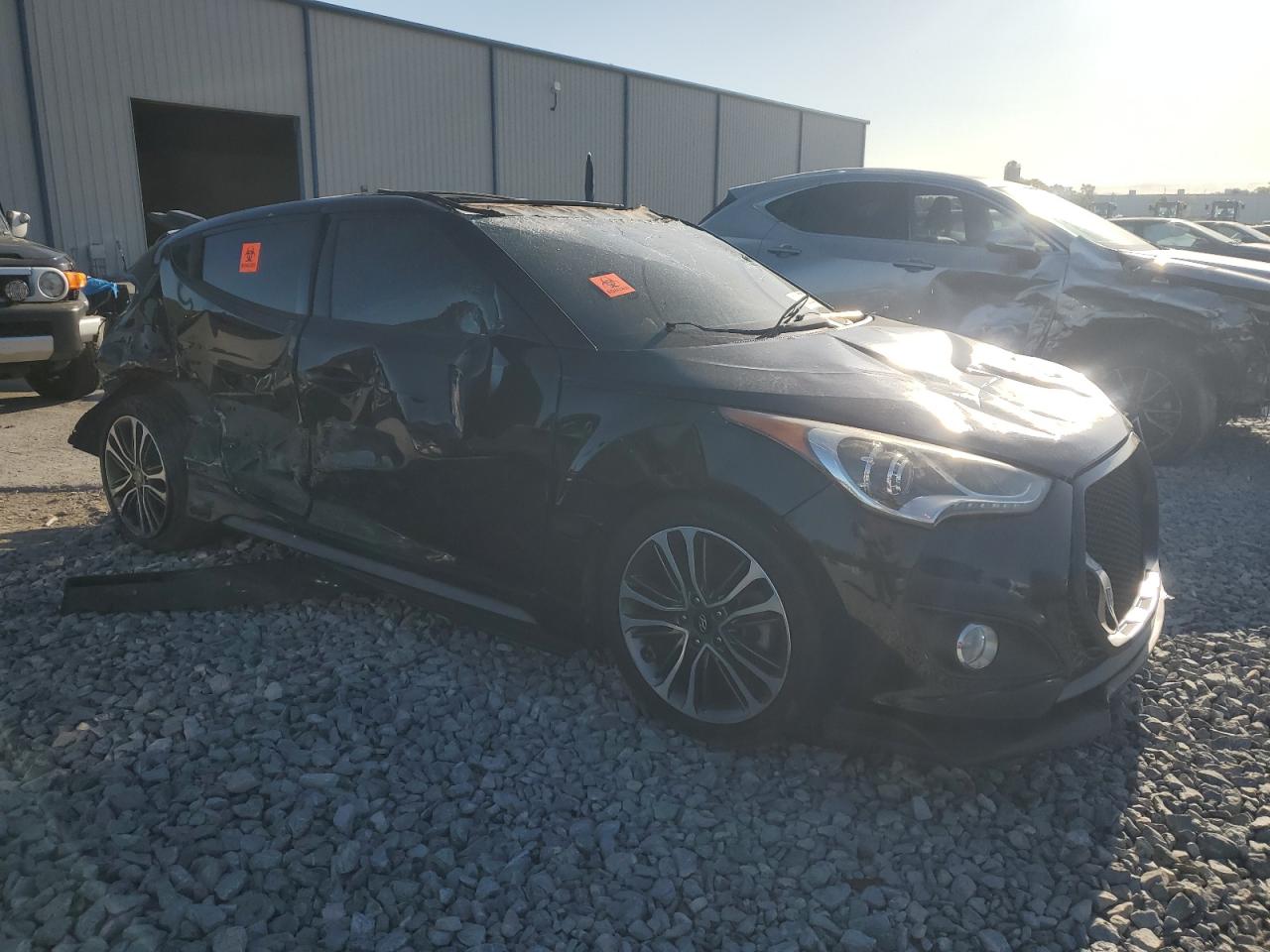 2016 Hyundai Veloster VIN KMHTC6AEXGU291834 Copart auction photo, rollover damage thumbnail 4