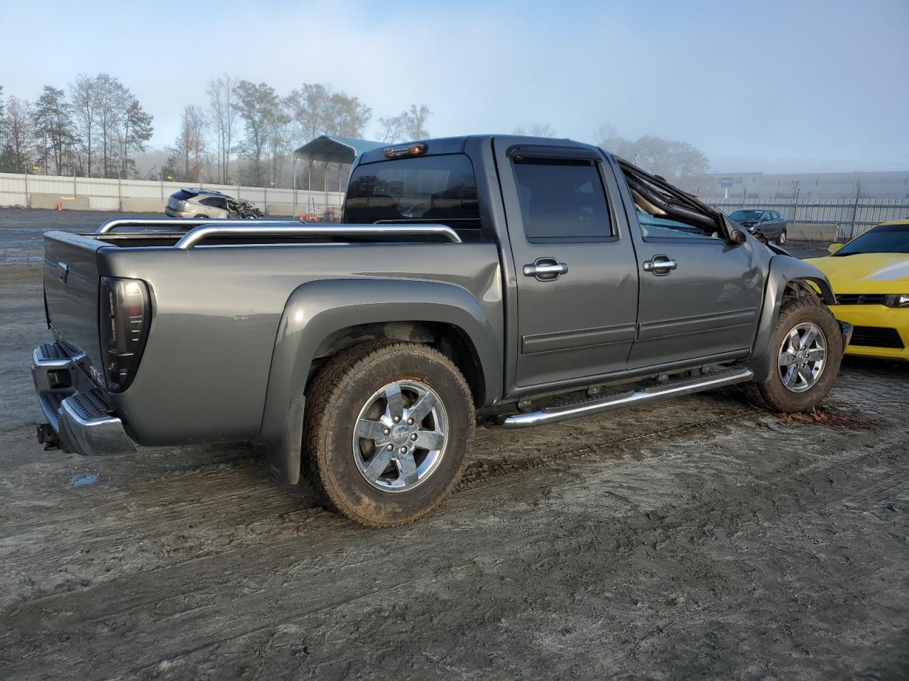 2012 GMC Canyon VIN 1GTH5MFE2C8132732 Copart auction photo, top/roof damage thumbnail 3