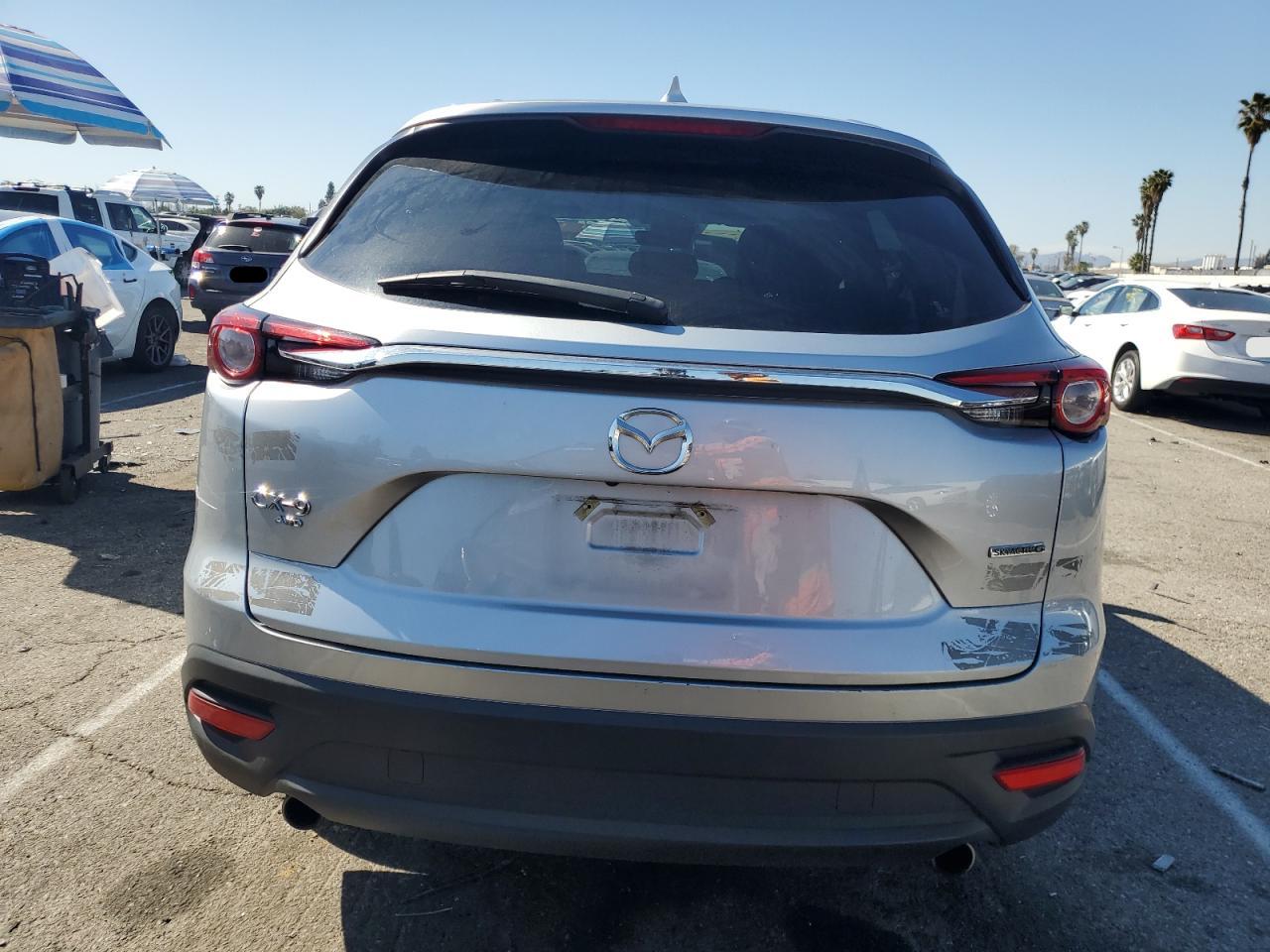 2023 Mazda CX-9 VIN JM3TCBAYXP0659516 Copart auction photo, front end / side damage thumbnail 6