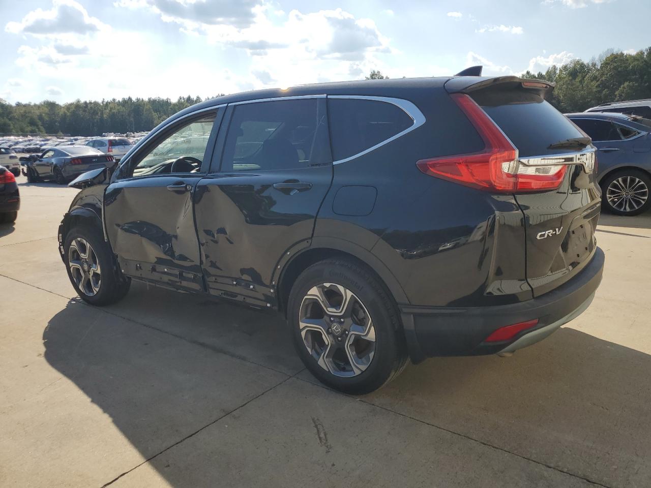 2018 Honda CR-V VIN 7FARW1H8XJE031379 Copart auction photo, side / front end damage thumbnail 2