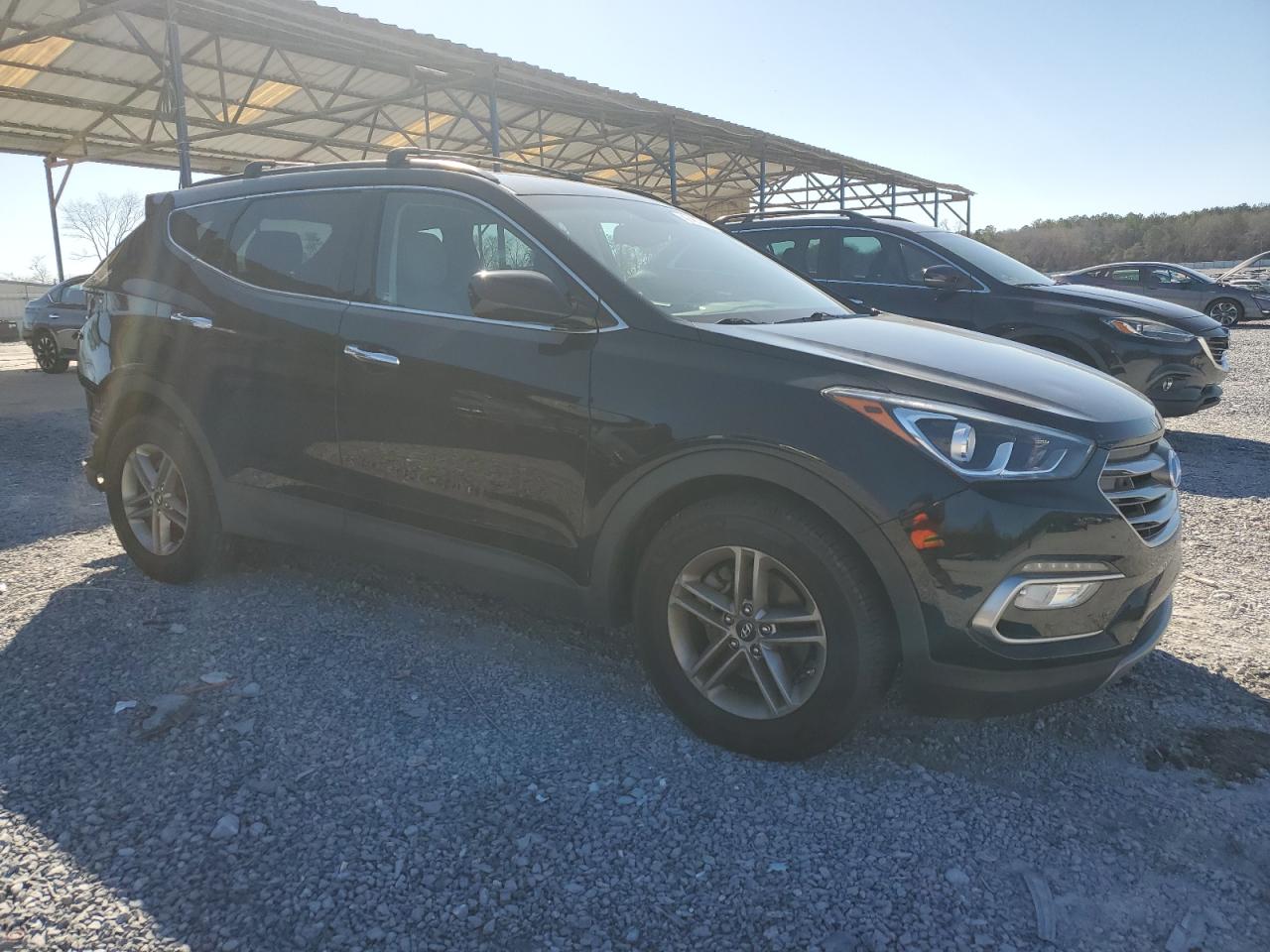 2017 Hyundai Santa Fe VIN 5XYZU3LB4HG429724 Copart auction photo, rear end damage thumbnail 4