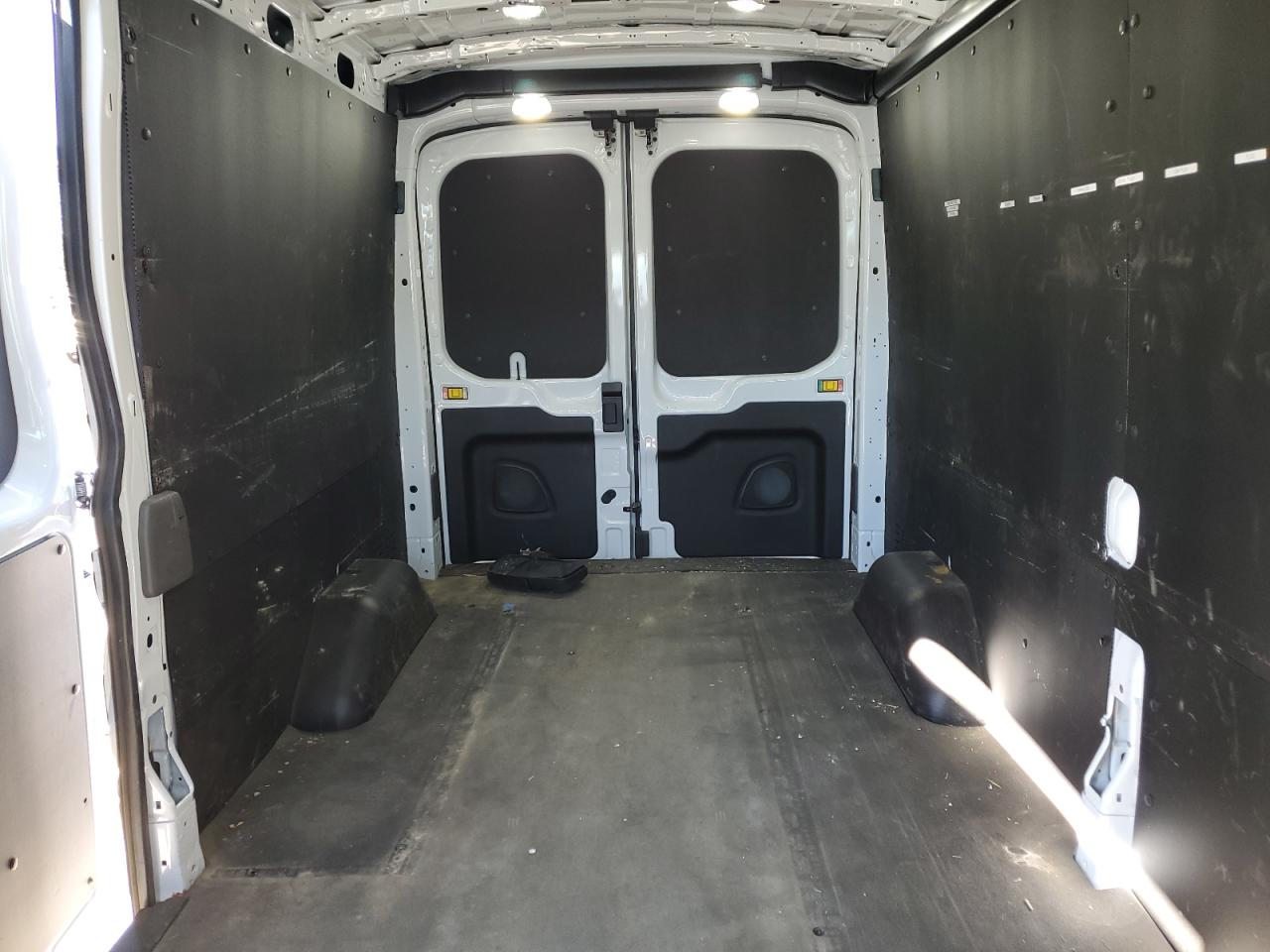 2023 Ford Transit VIN 1FTBR1CG0PKA89404 Copart auction photo, side damage thumbnail 10