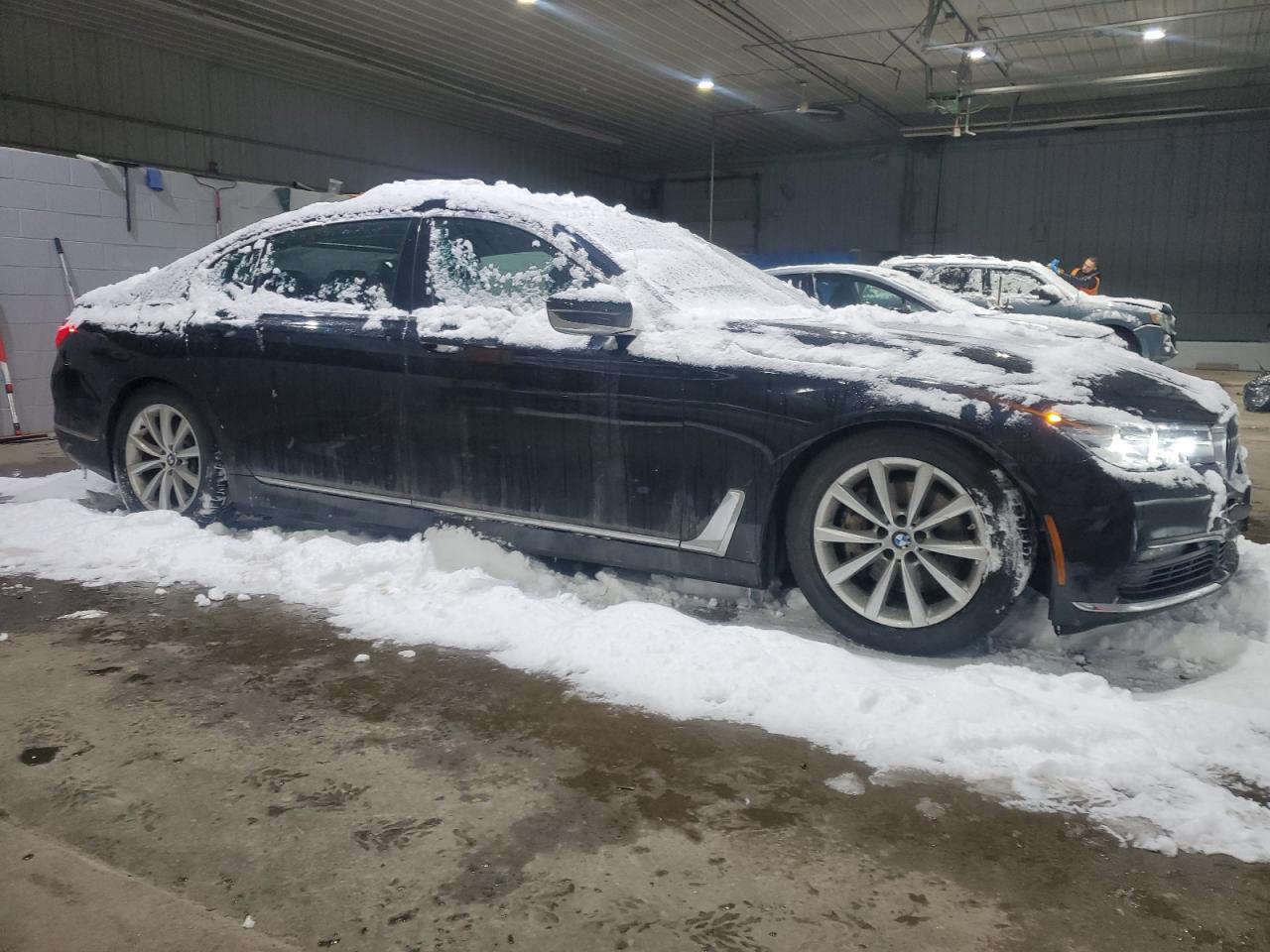 2017 BMW 7er VIN WBA7E4C55HGU99781 Copart auction photo, side / minor dent/scratches damage thumbnail 4
