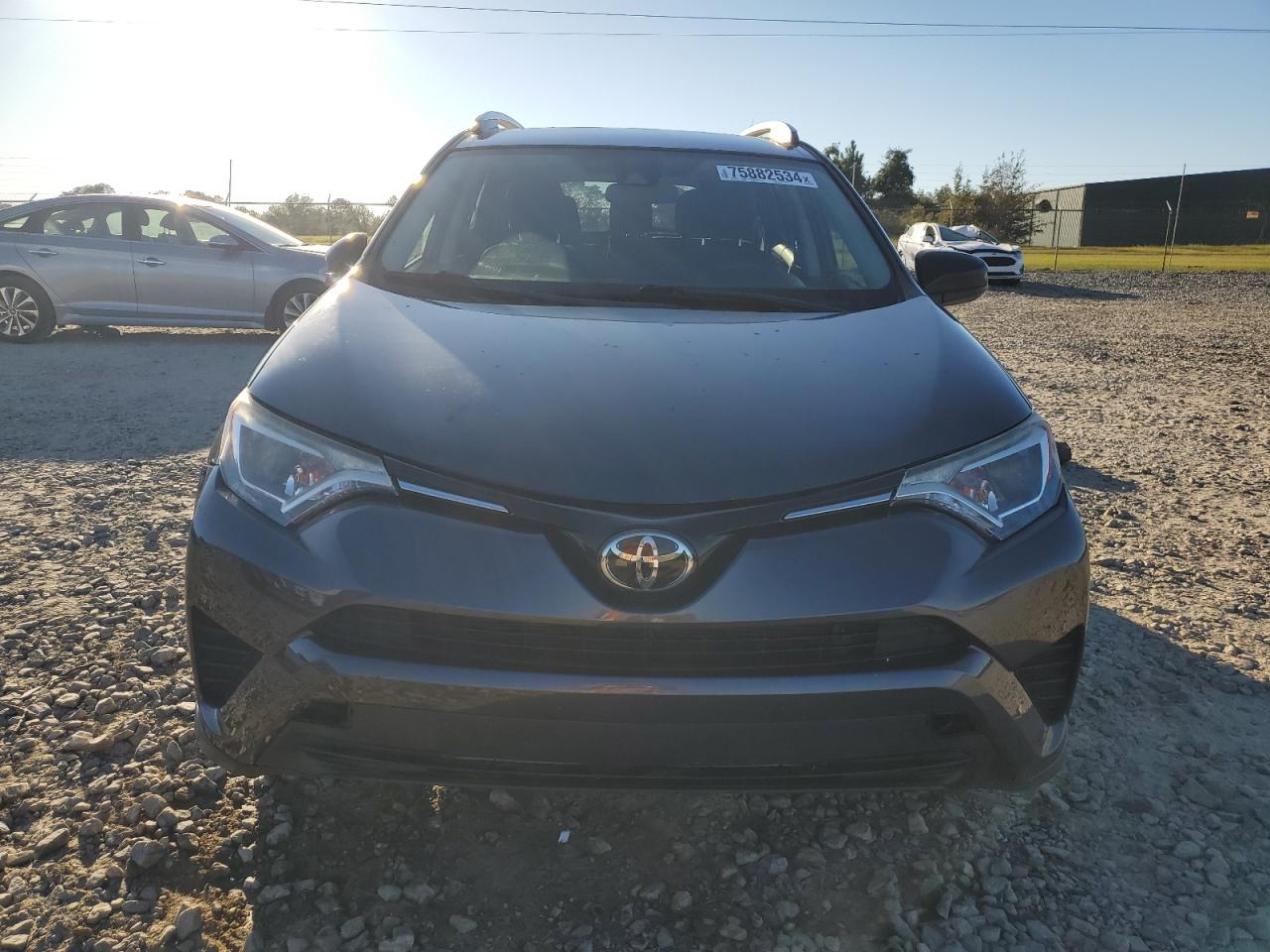 2017 Toyota RAV 4 VIN JTMZFREV7HJ702014 Copart auction photo, side / rear end damage thumbnail 5
