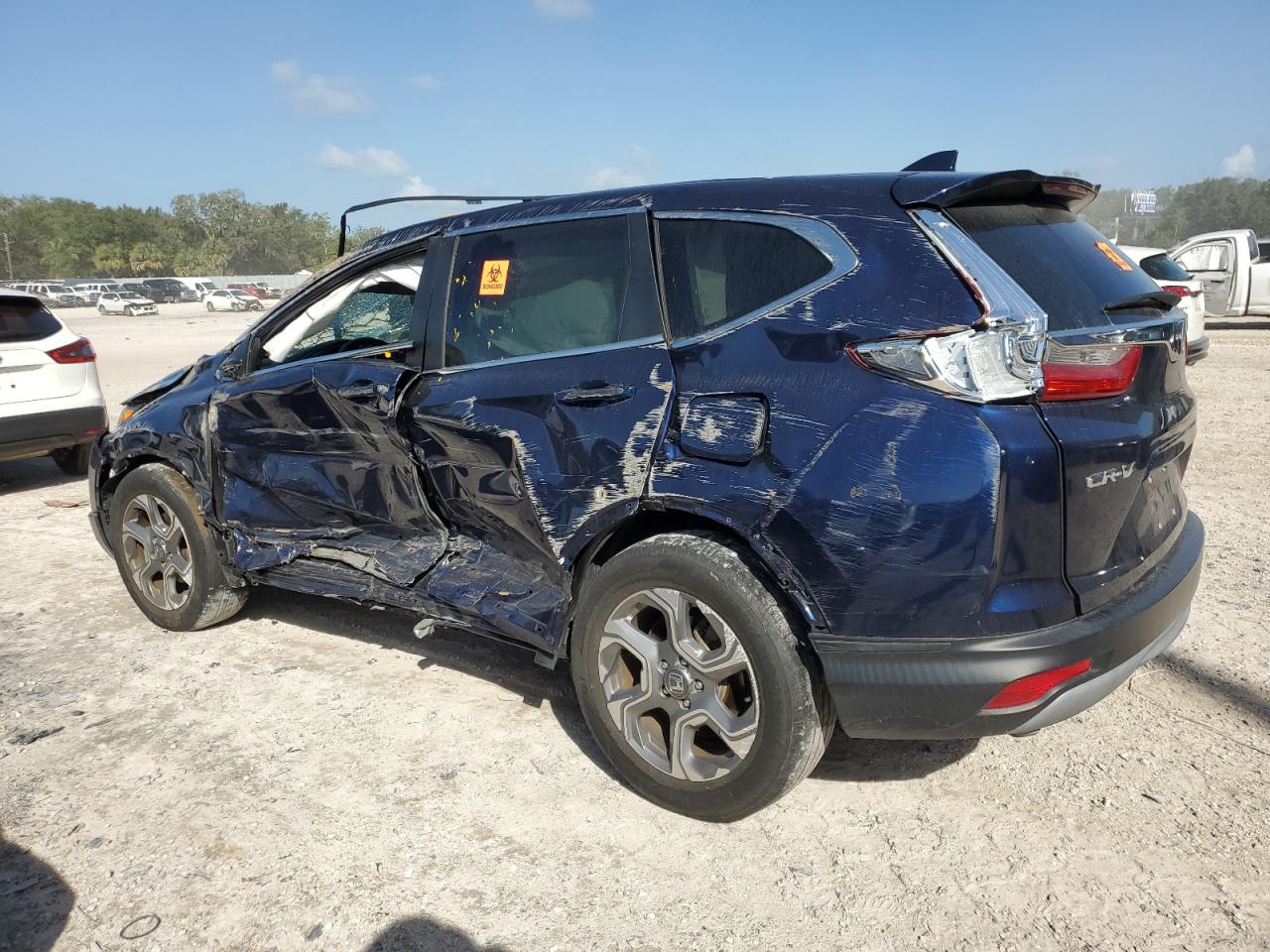 2019 Honda CR-V VIN 7FARW1H80KE029190 Copart auction photo, rollover damage thumbnail 2
