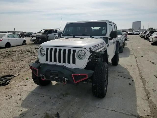 2021 Jeep Wrangler VIN 1C4HJXDNXMW678692 Copart auction photo, rear end damage thumbnail 11