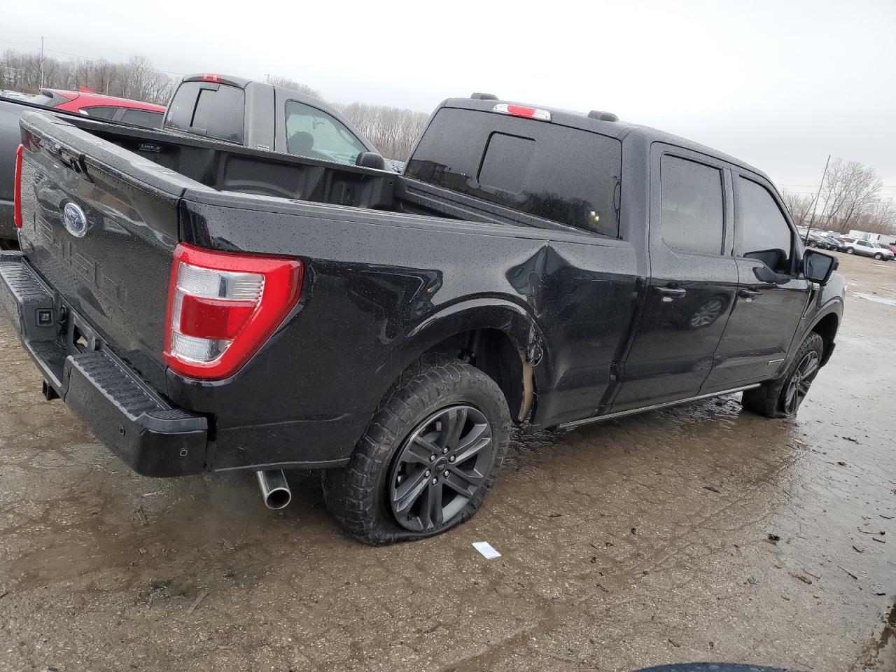 2023 Ford F-150 VIN 1FTFW1ED0PFB45556 Copart auction photo, side / all over damage thumbnail 3