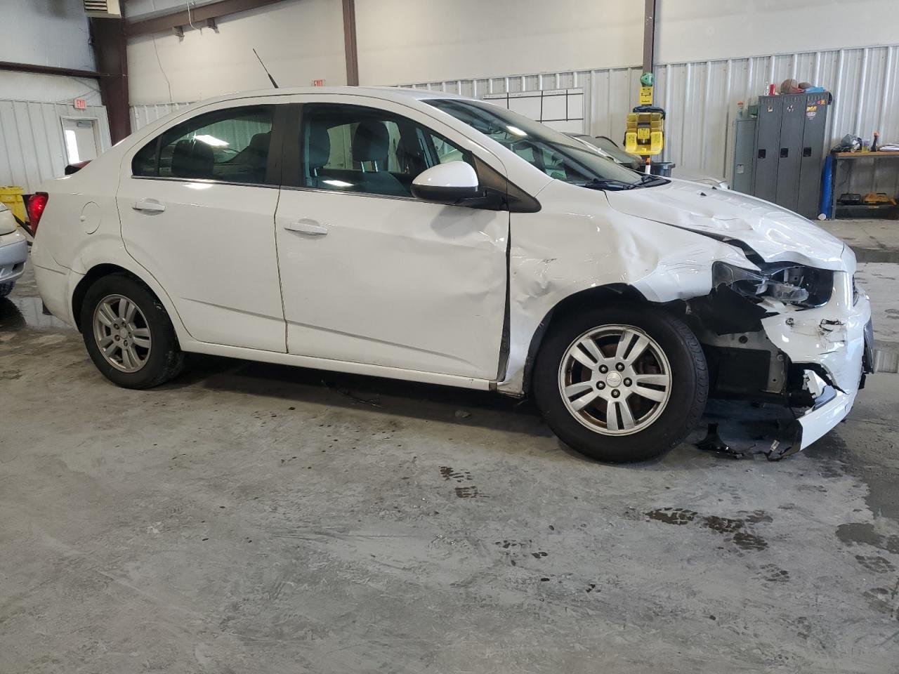 2014 Chevrolet Sonic VIN 1G1JC5SH6E4146228 Copart auction photo, front end / side damage thumbnail 4