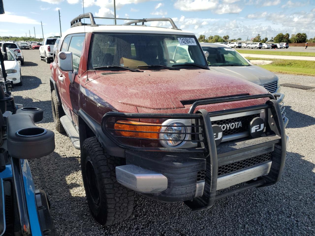 2011 Toyota FJ Cruiser VIN JTEBU4BF3BK106581 Copart auction photo, water/flood damage thumbnail 4