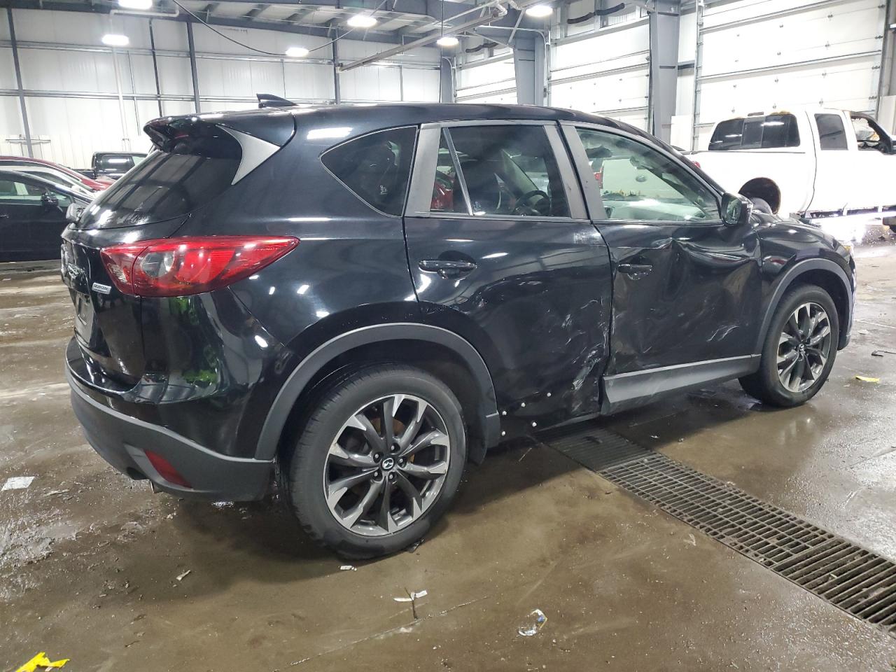 2016 Mazda CX-5 VIN JM3KE4DYXG0822209 Copart auction photo, side damage thumbnail 3