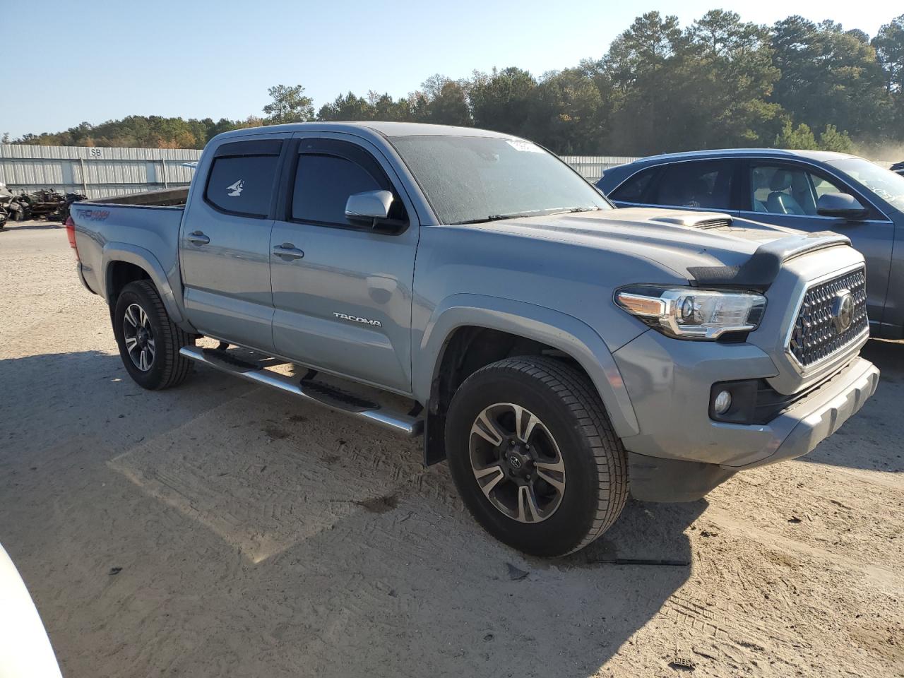 2019 Toyota Tacoma VIN 3TMCZ5AN2KM247837 Copart auction photo, rear end damage thumbnail 4
