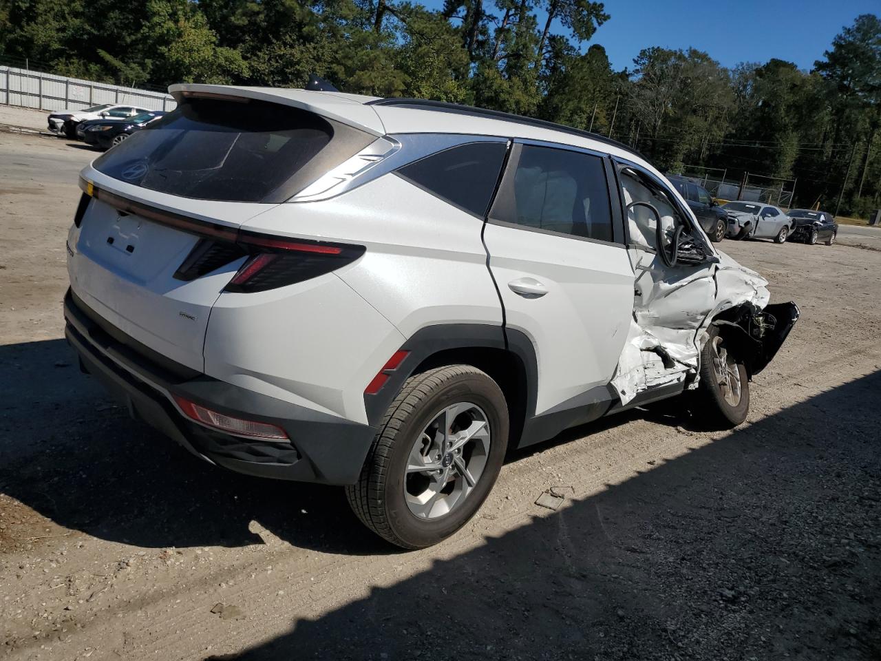 2022 Hyundai Tucson VIN 5NMJBCAE8NH074042 Copart auction photo, side / front end damage thumbnail 3