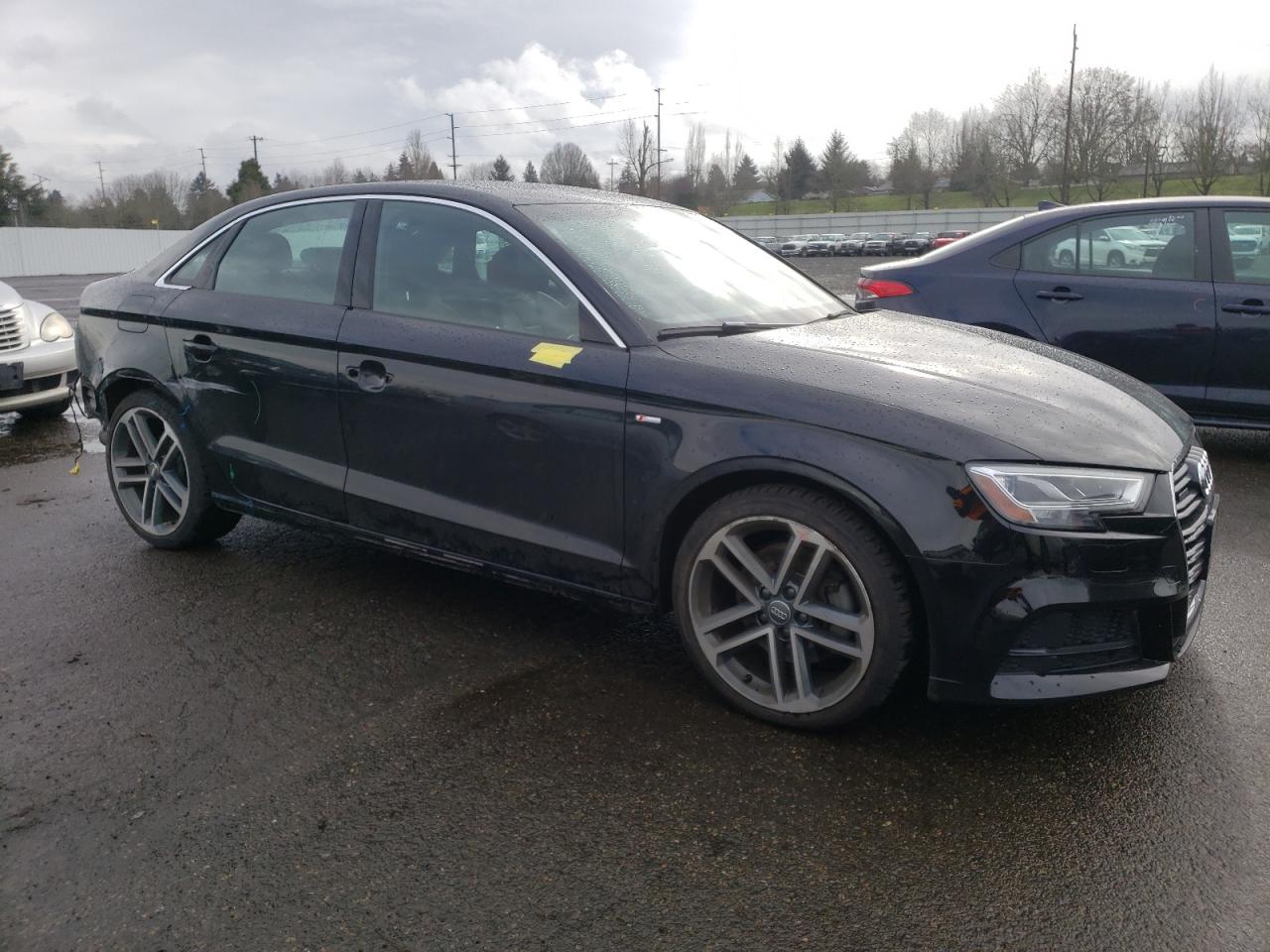 2018 Audi A3 VIN WAUJ8GFF4J1028412 Copart auction photo, side / rear end damage thumbnail 4
