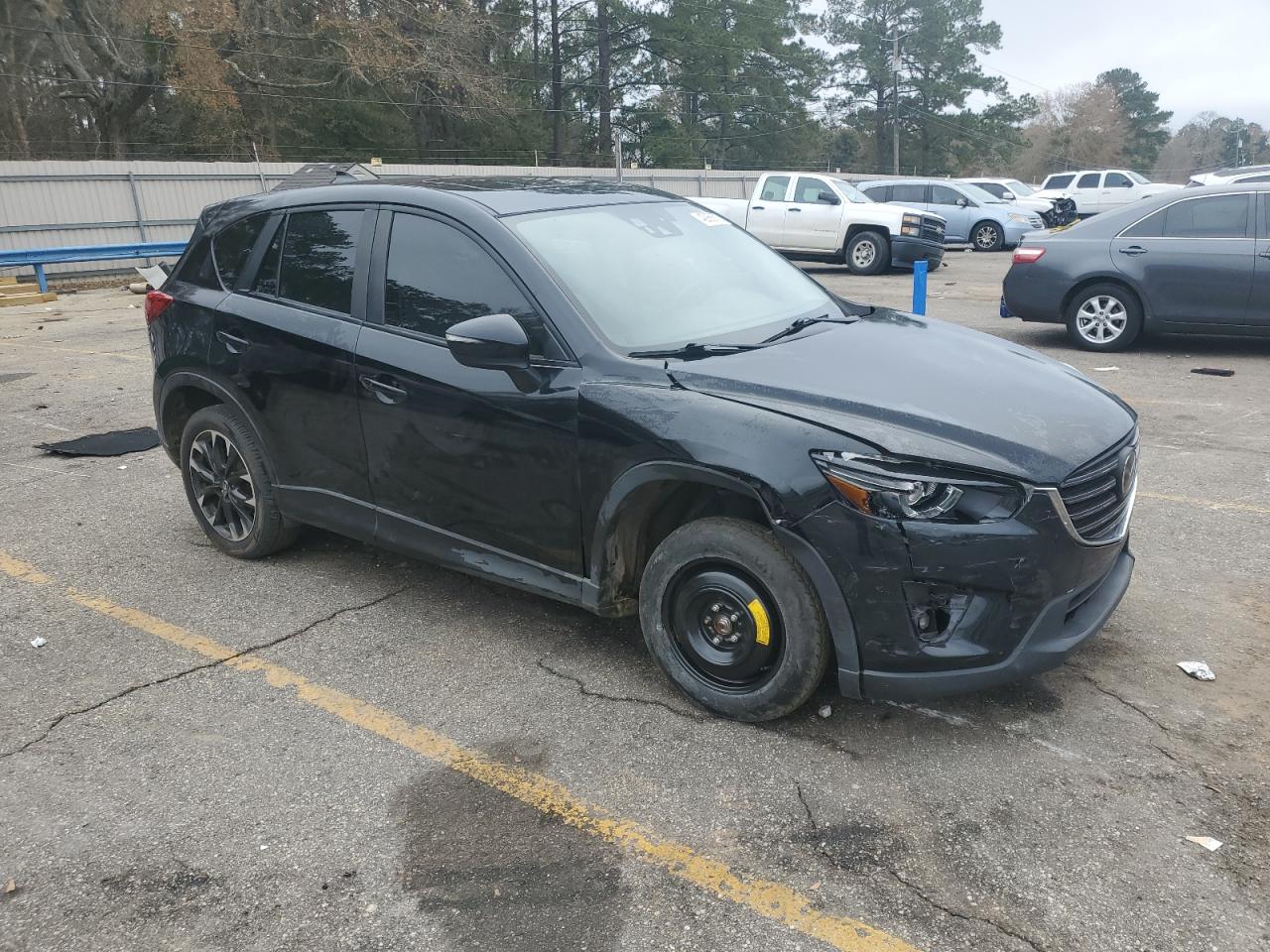 2016 Mazda CX-5 VIN JM3KE4DY8G0606391 Copart auction photo, front end damage thumbnail 4
