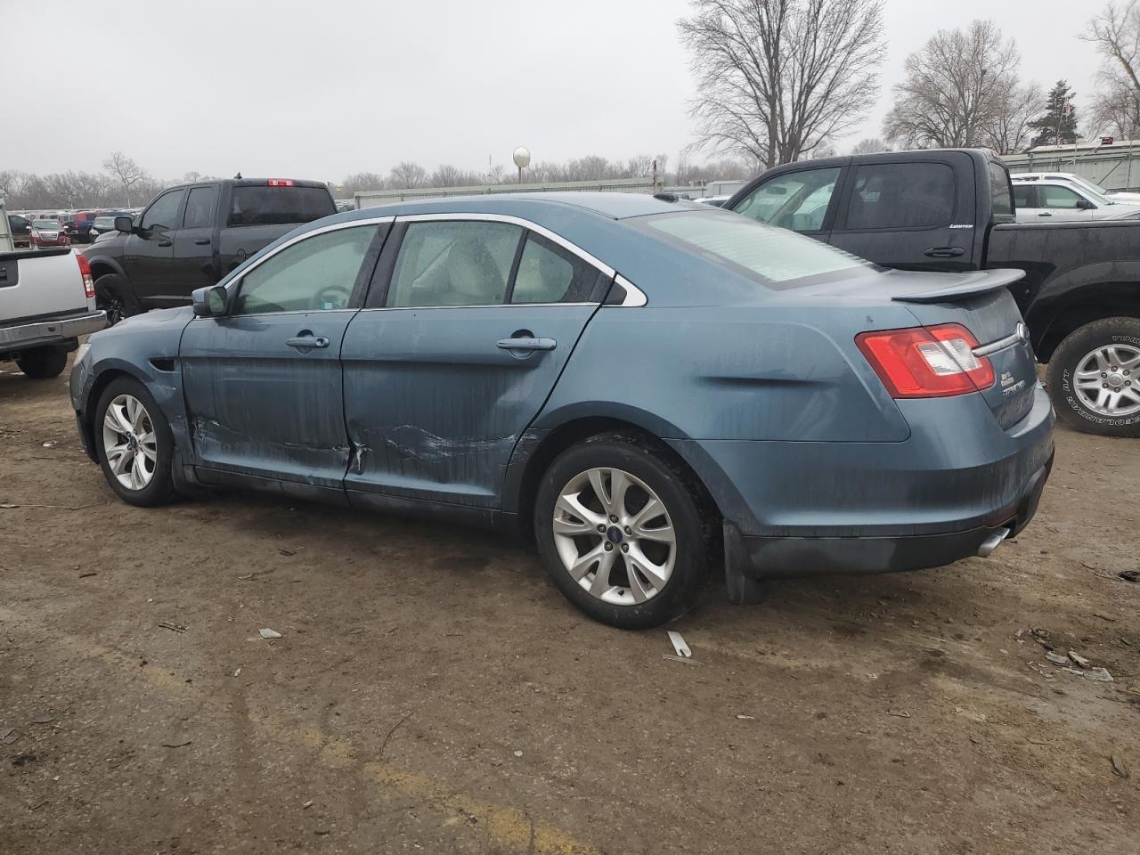 2010 Ford Taurus VIN 1FAHP2EW3AG113575 Copart auction photo, side / front end damage thumbnail 2