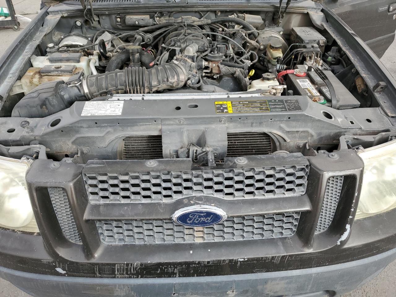 2005 Ford Explorer VIN 1FMZU77K05UA98289 Copart auction photo, rear end / minor dent/scratches damage thumbnail 12