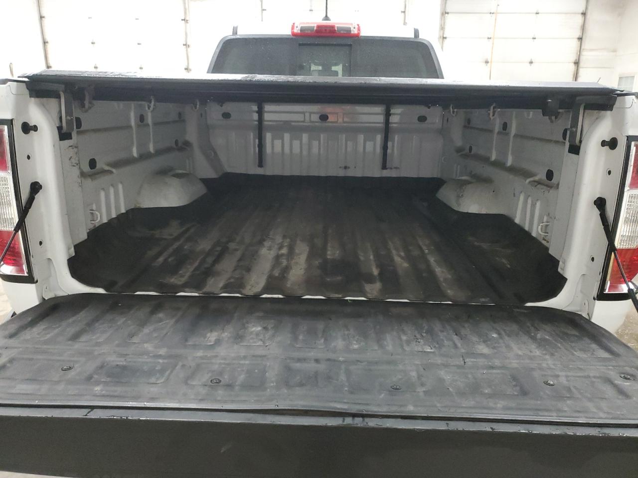 2022 GMC Canyon VIN 1GTG6FEN0N1224911 Copart auction photo, front end / minor dent/scratches damage thumbnail 6