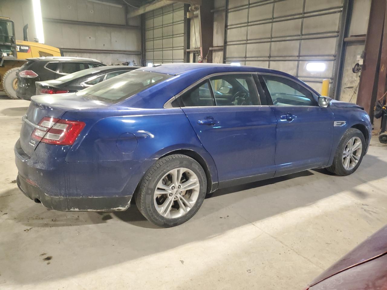 2015 Ford Taurus VIN 1FAHP2E81FG179499 Copart auction photo, front end / minor dent/scratches damage thumbnail 3