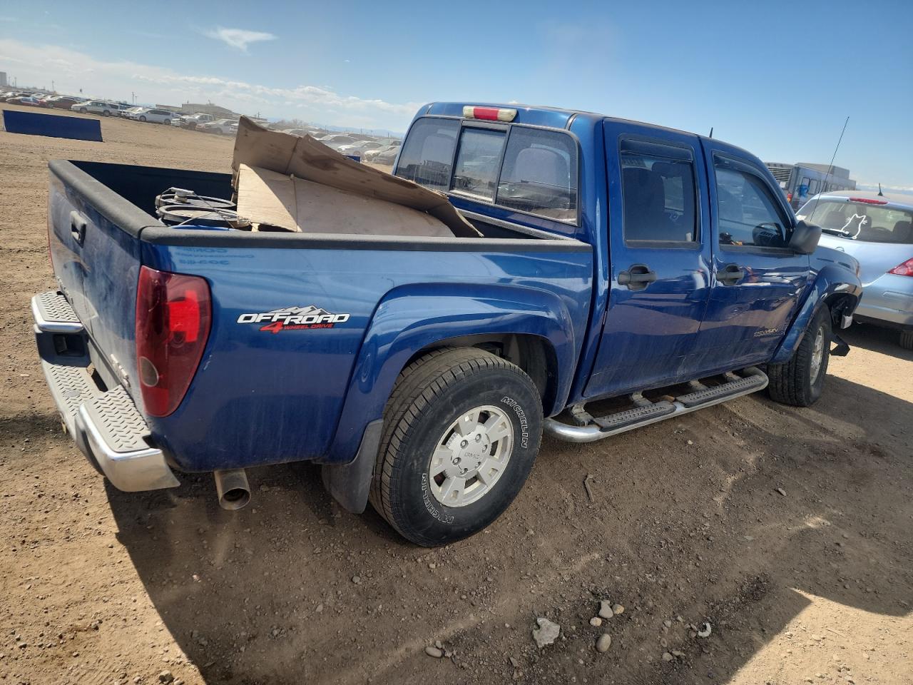2005 GMC Canyon VIN 1GTDT136958218686 Copart auction photo, side / front end damage thumbnail 3