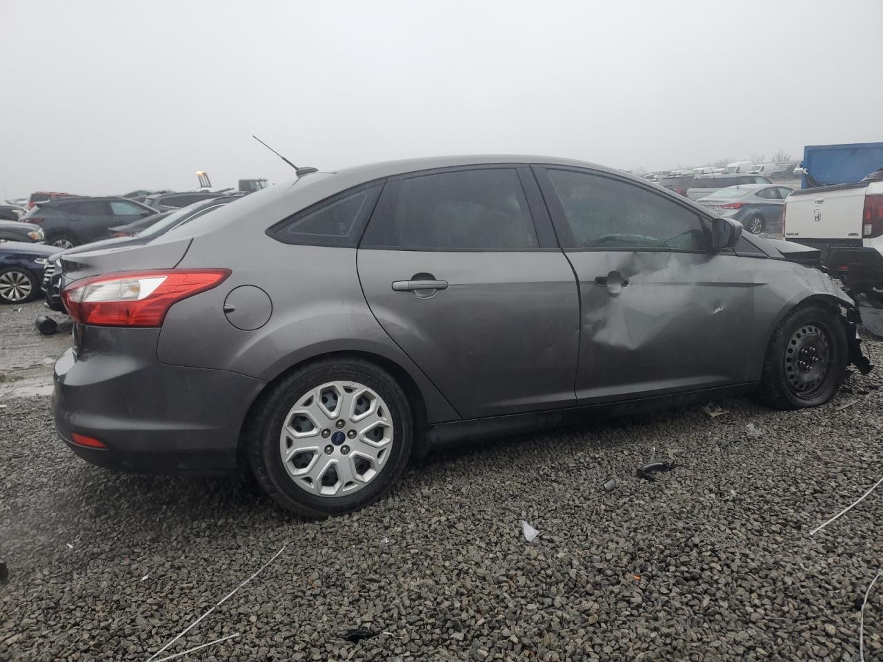 2012 Ford Focus VIN 1FAHP3F2XCL385813 Copart auction photo, all over / front end damage thumbnail 3