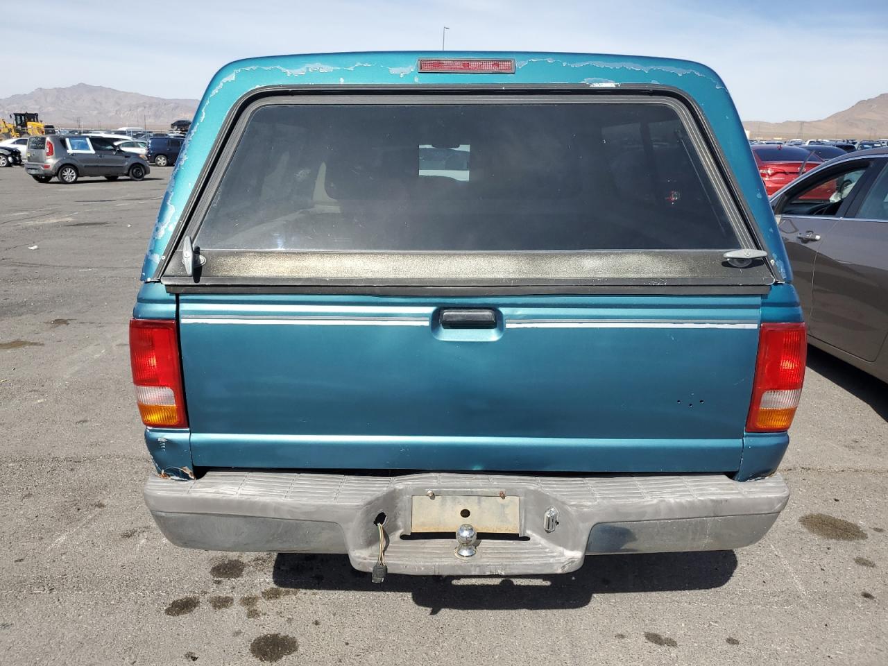 1994 Ford Ranger VIN 1FTCR14A8RPA04491 Copart auction photo, minor dent/scratches damage thumbnail 6