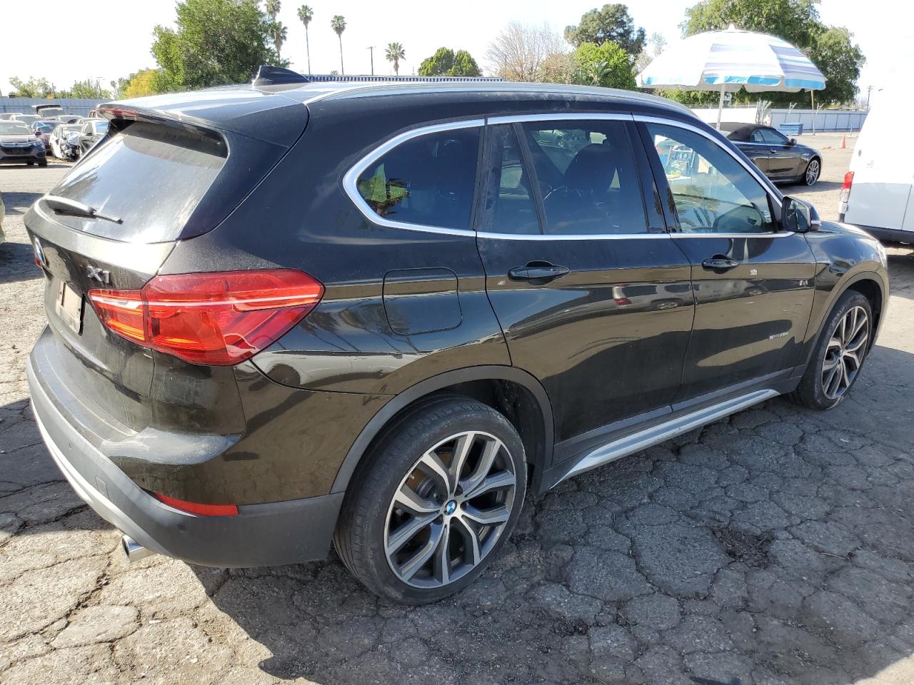 2017 BMW X1 VIN WBXHU7C31H5H36925 Copart auction photo, side / minor dent/scratches damage thumbnail 3