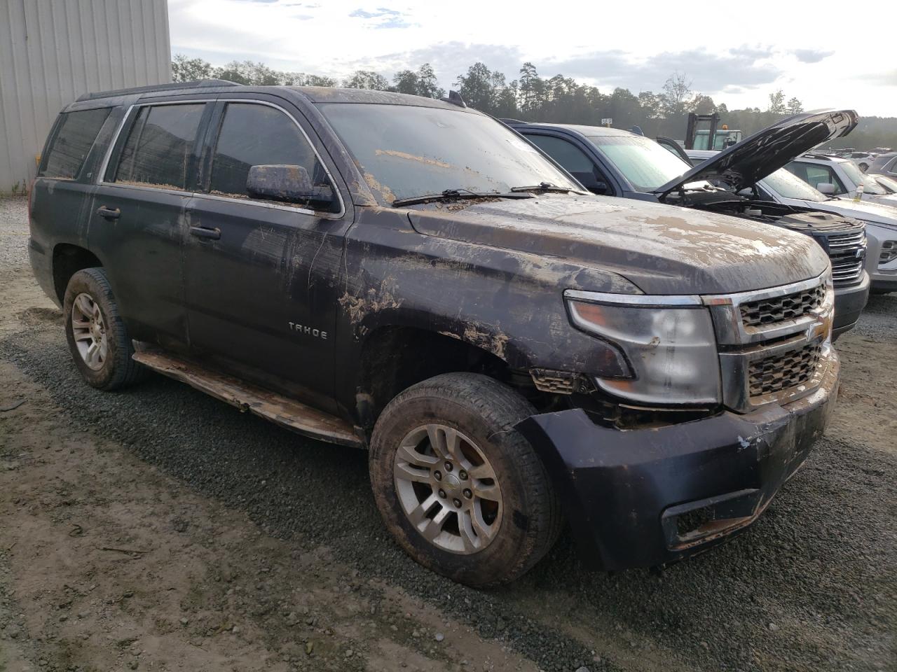 2015 Chevrolet Tahoe VIN 1GNSKBKC9FR636725 Copart auction photo, water/flood damage thumbnail 4