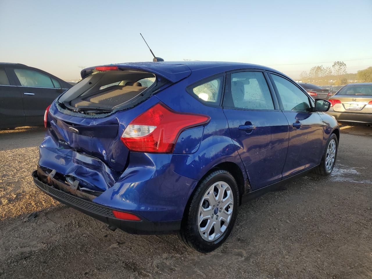 2012 Ford Focus VIN 1FAHP3K2XCL299262 Copart auction photo, hail / rear end damage thumbnail 3