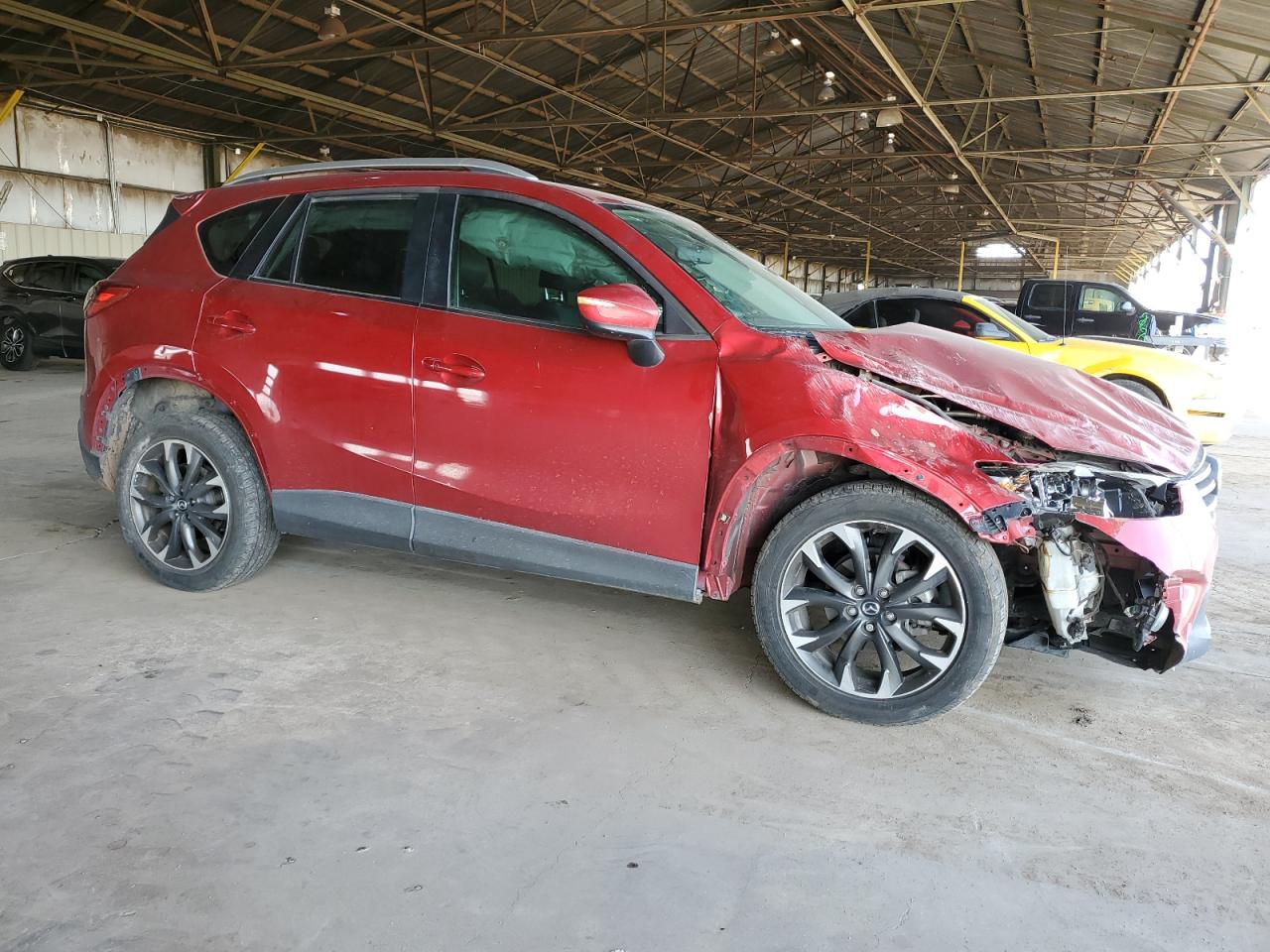 2016 Mazda CX-5 VIN JM3KE2DY8G0615015 Copart auction photo, rollover damage thumbnail 4
