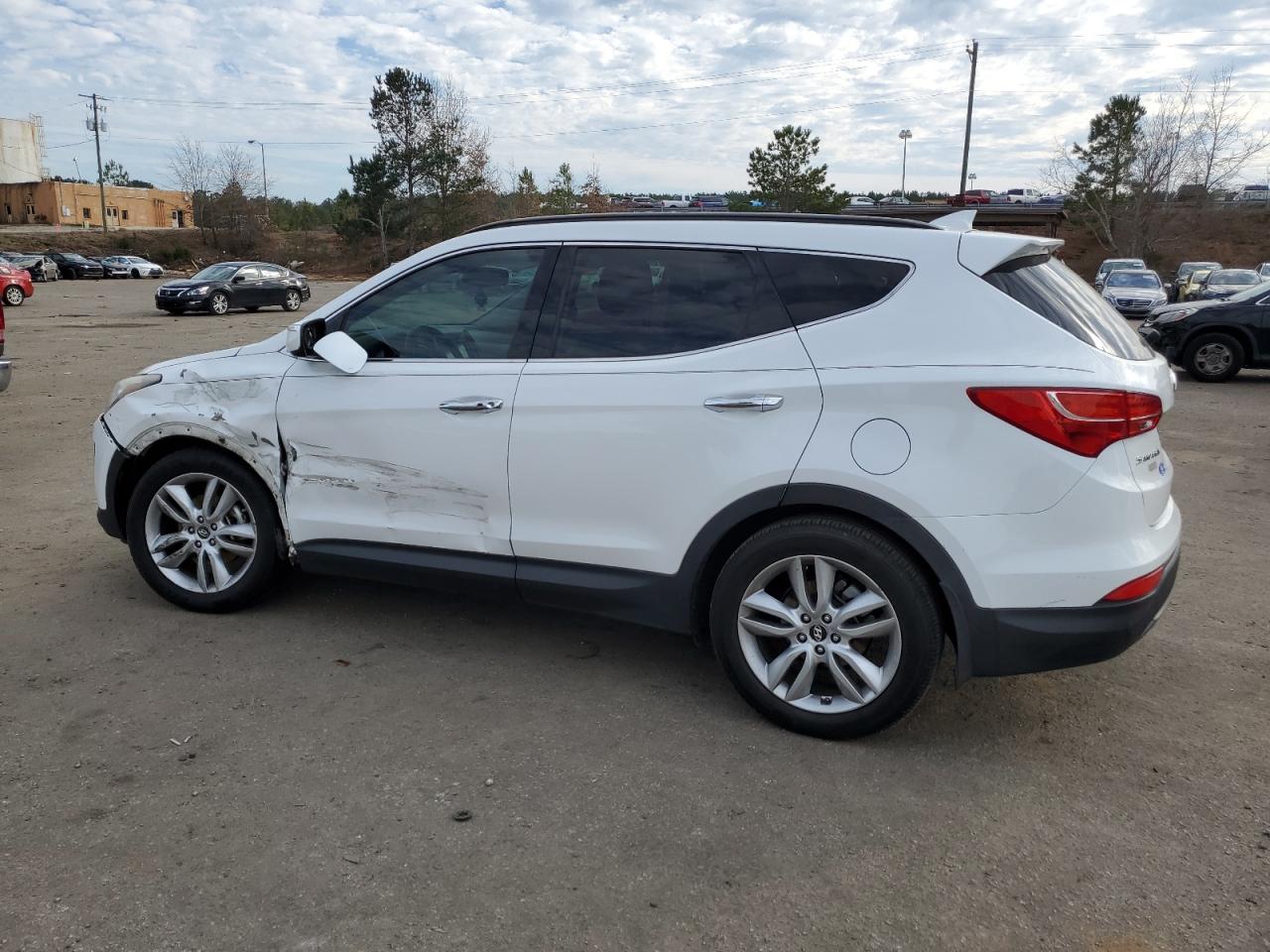 2014 Hyundai Santa Fe VIN 5XYZU3LA2EG189236 Copart auction photo, side / front end damage thumbnail 2
