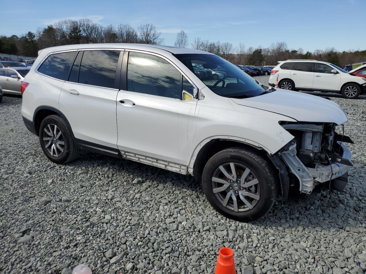 2022 Honda Pilot VIN 5FNYF5H59NB016074 Copart auction photo, front end / minor dent/scratches damage thumbnail 4