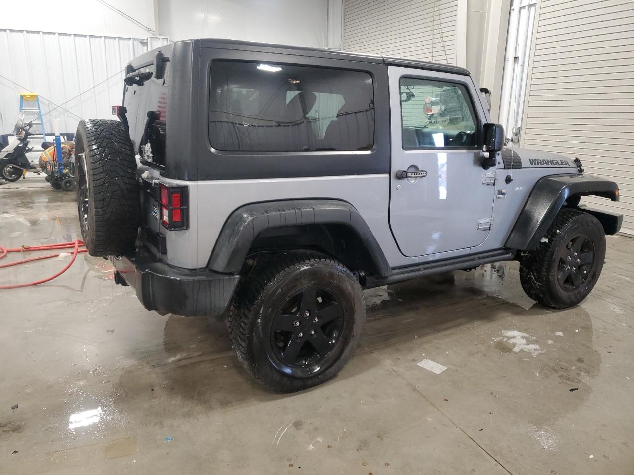 2016 Jeep Wrangler VIN 1C4AJWAGXGL136550 Copart auction photo, side damage thumbnail 3